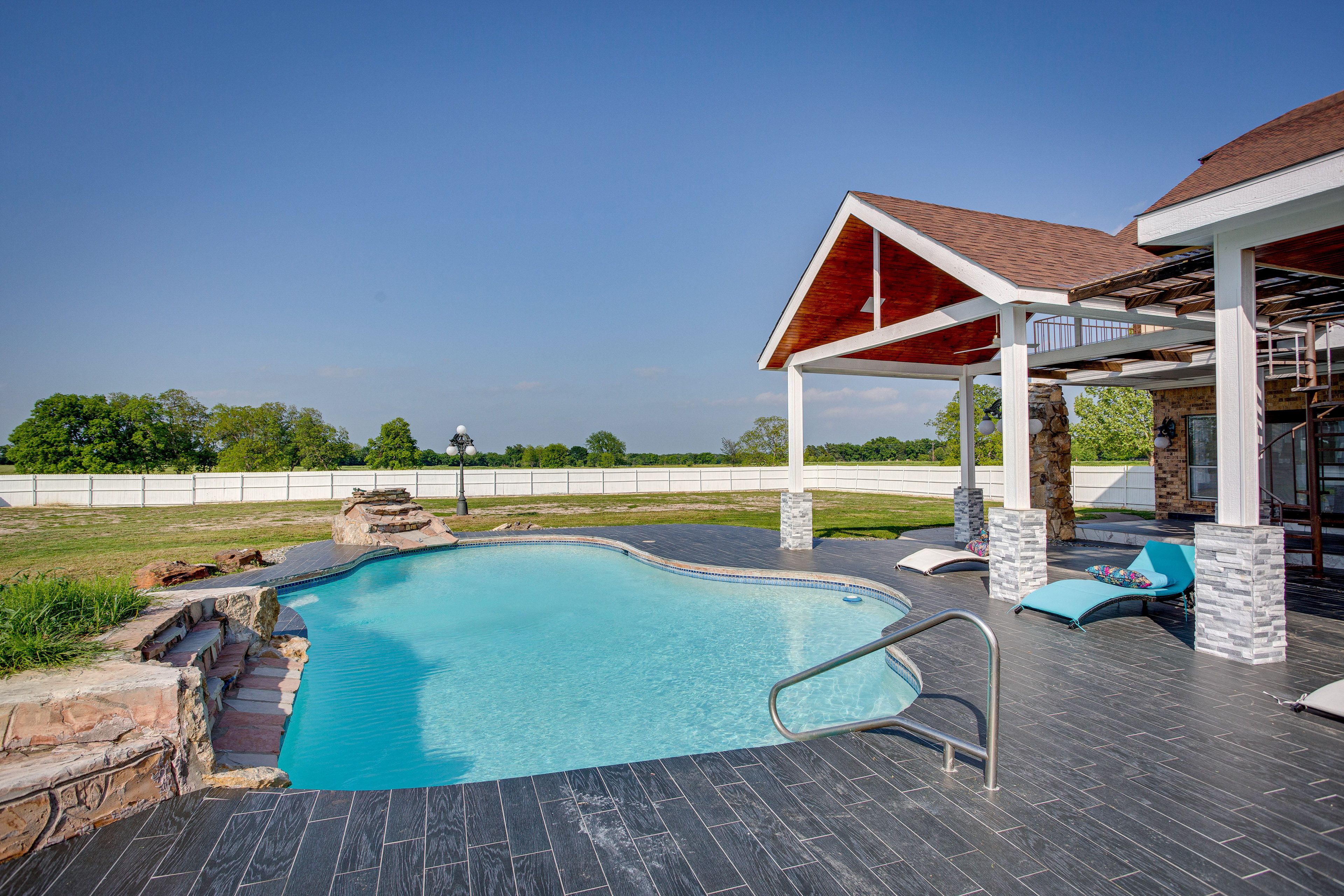Pool Area | Waterfall | Lounge Chairs | Outdoor Kitchen | Pet Friendly w/ Fee