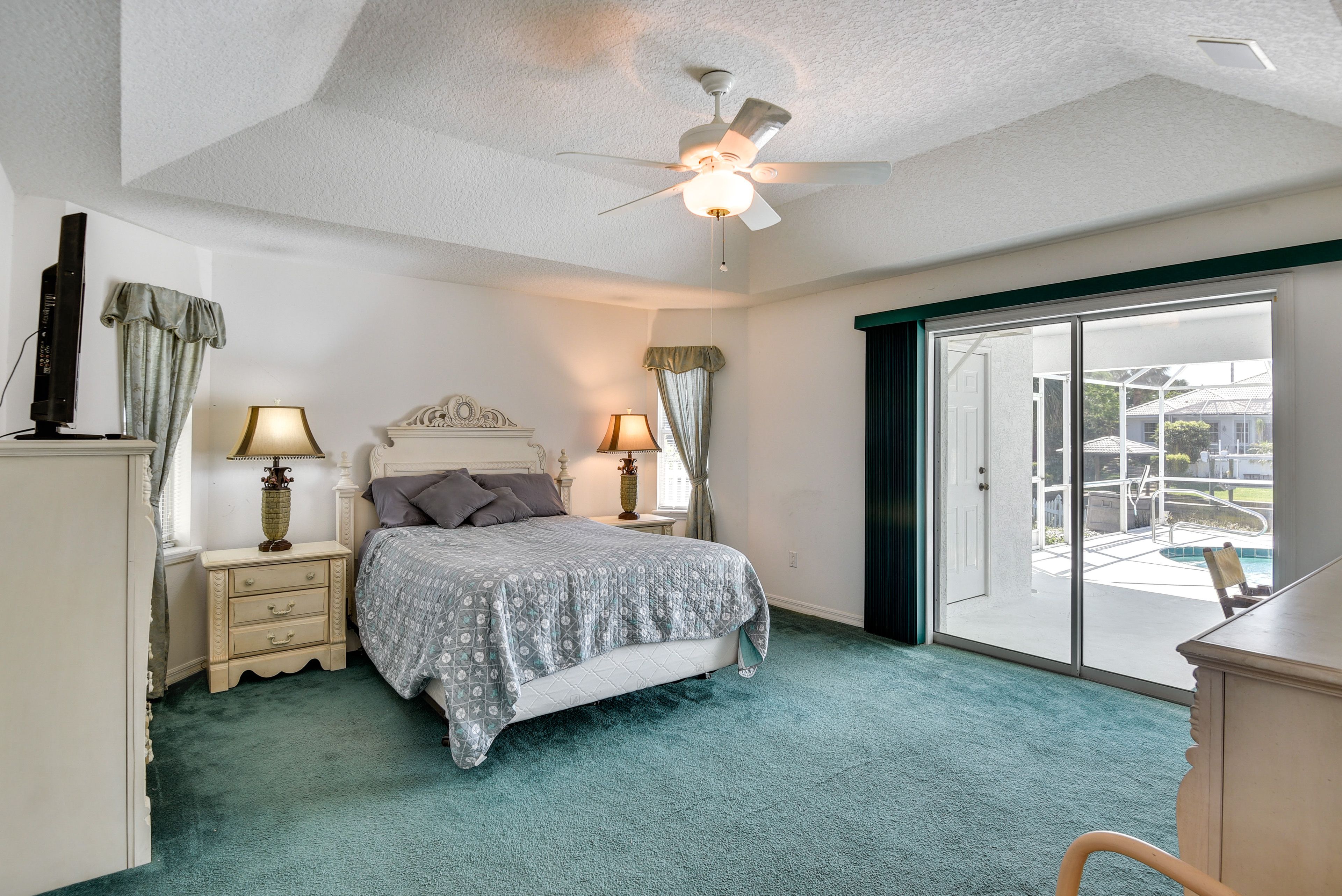 Bedroom 1 | Queen Bed | Smart TV | Patio Access