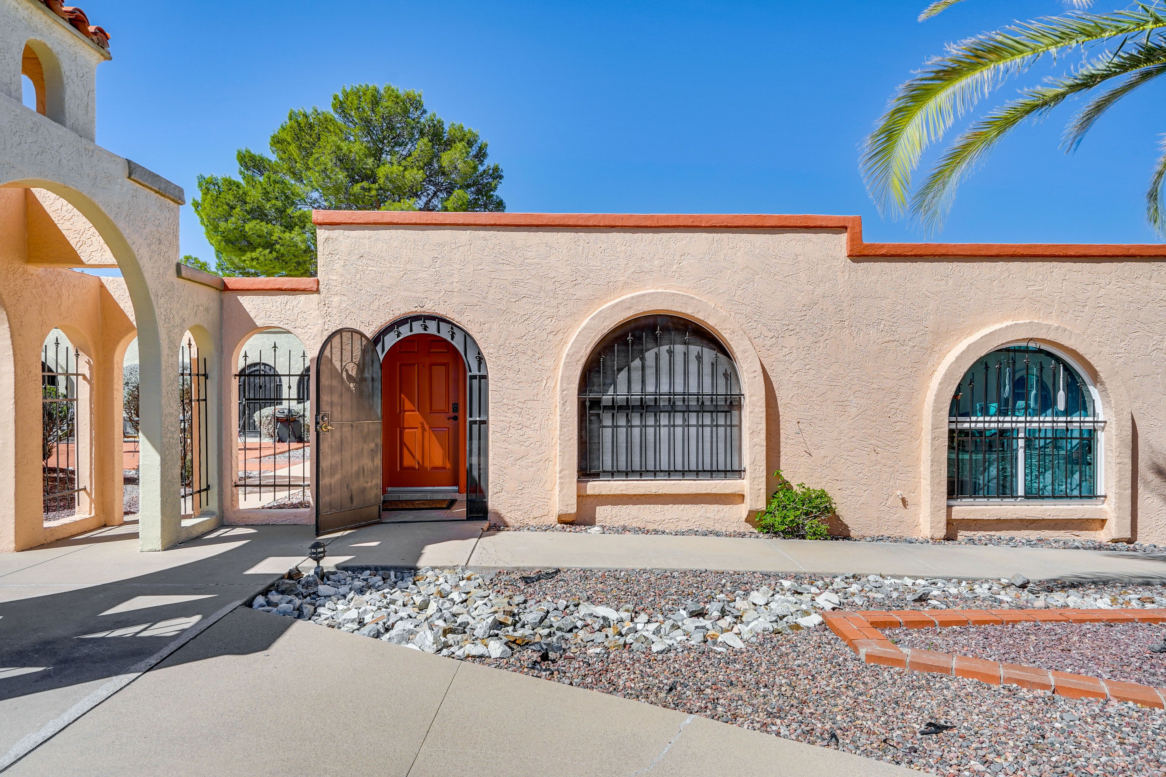 Townhouse Exterior | Community Surface Lot