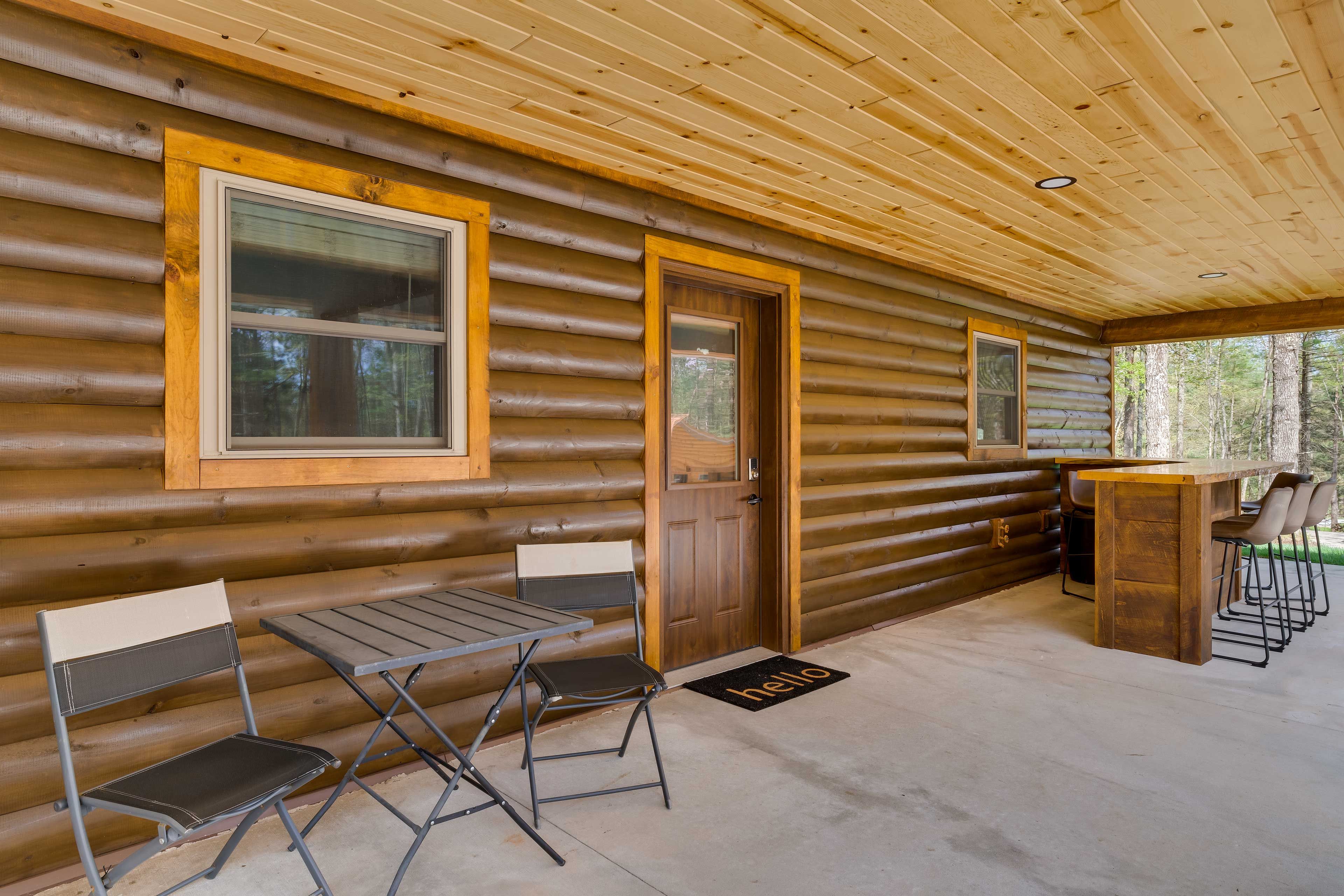 Cabin Exterior | Furnished Patio | Dining Area | Dry Bar