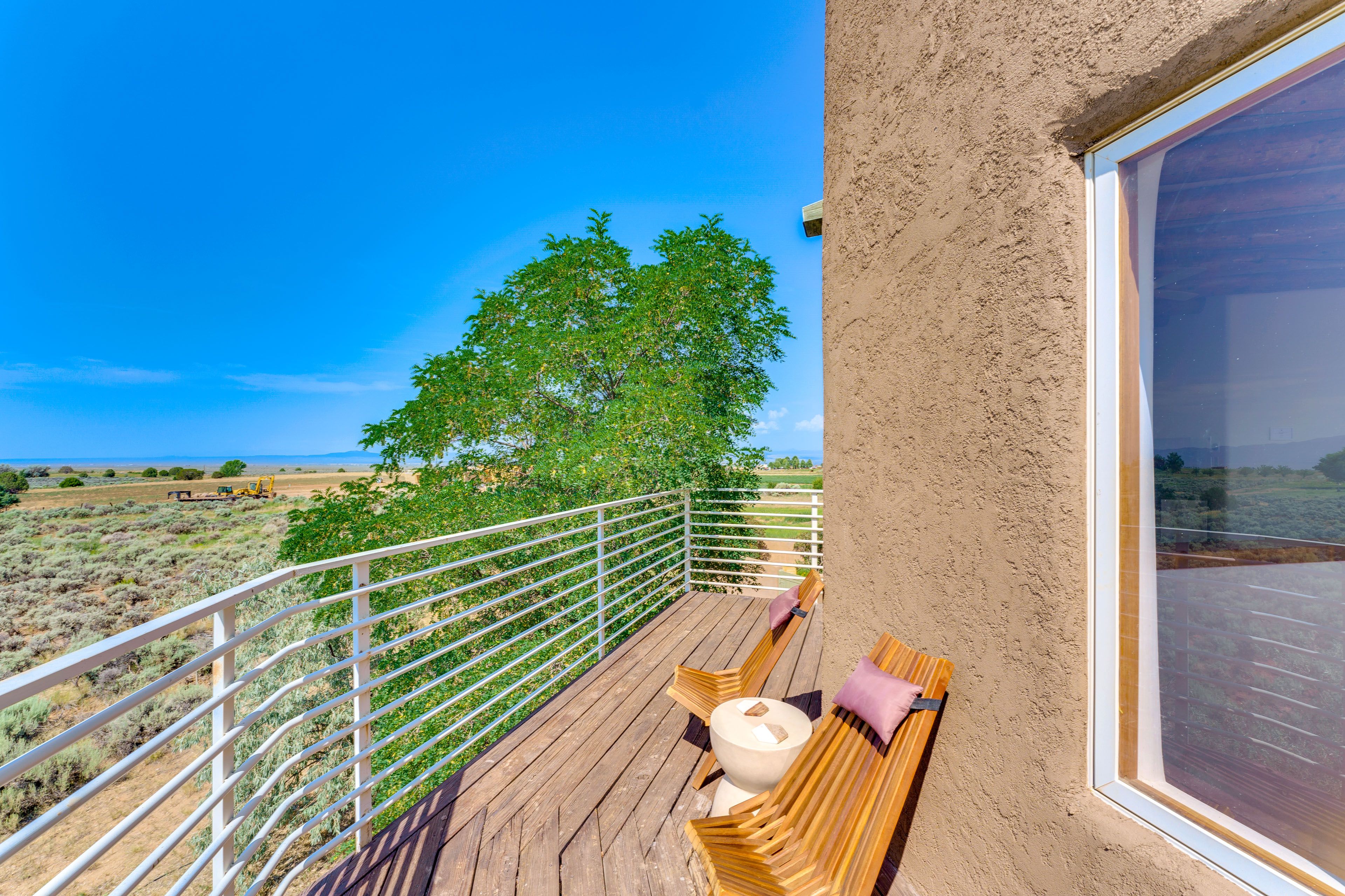 Balcony | Outdoor Seating | Taos Mountain Views