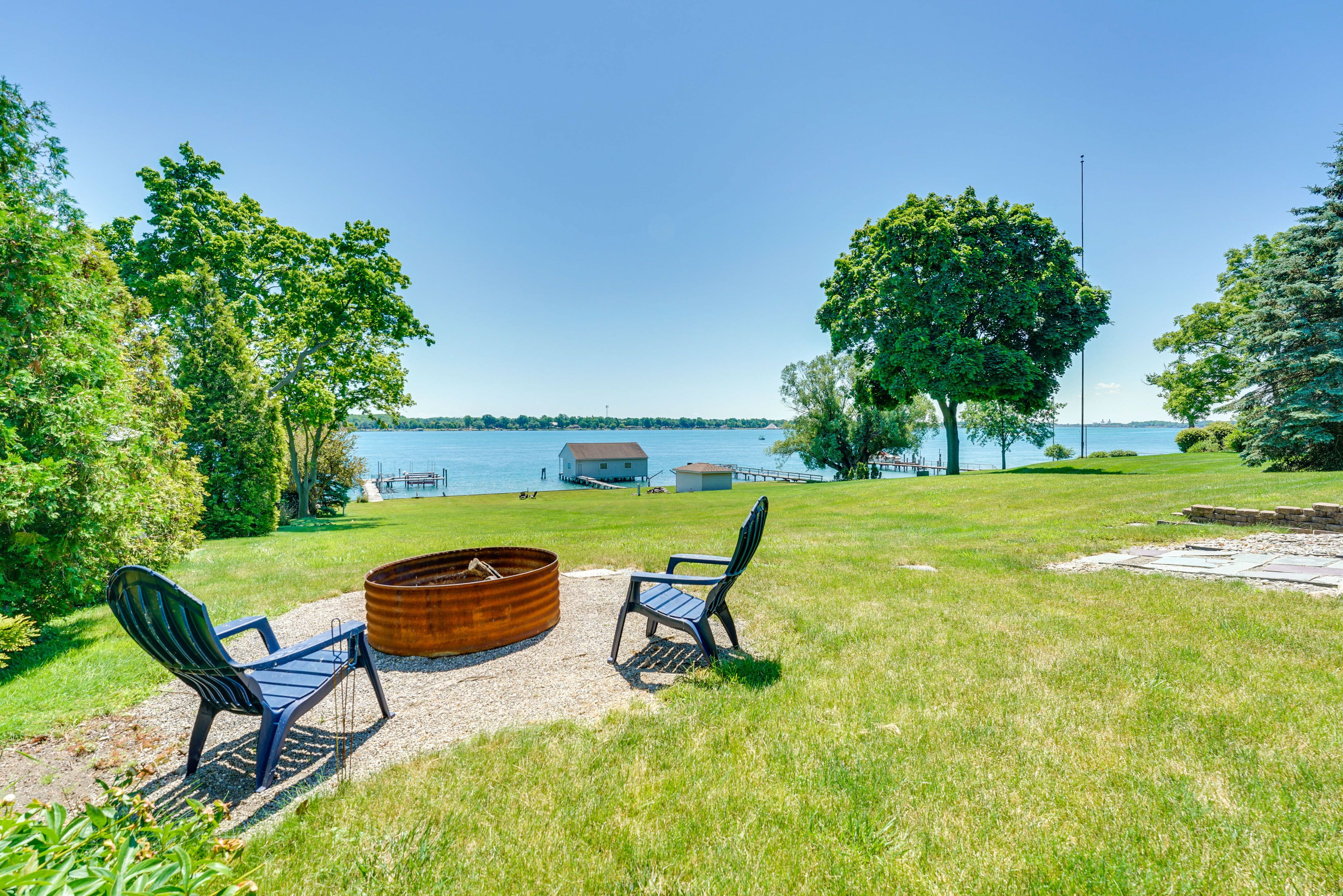 Yard | Fire Pit | St. Clair River Views | Dock & Boat Lift Not For Guest Use