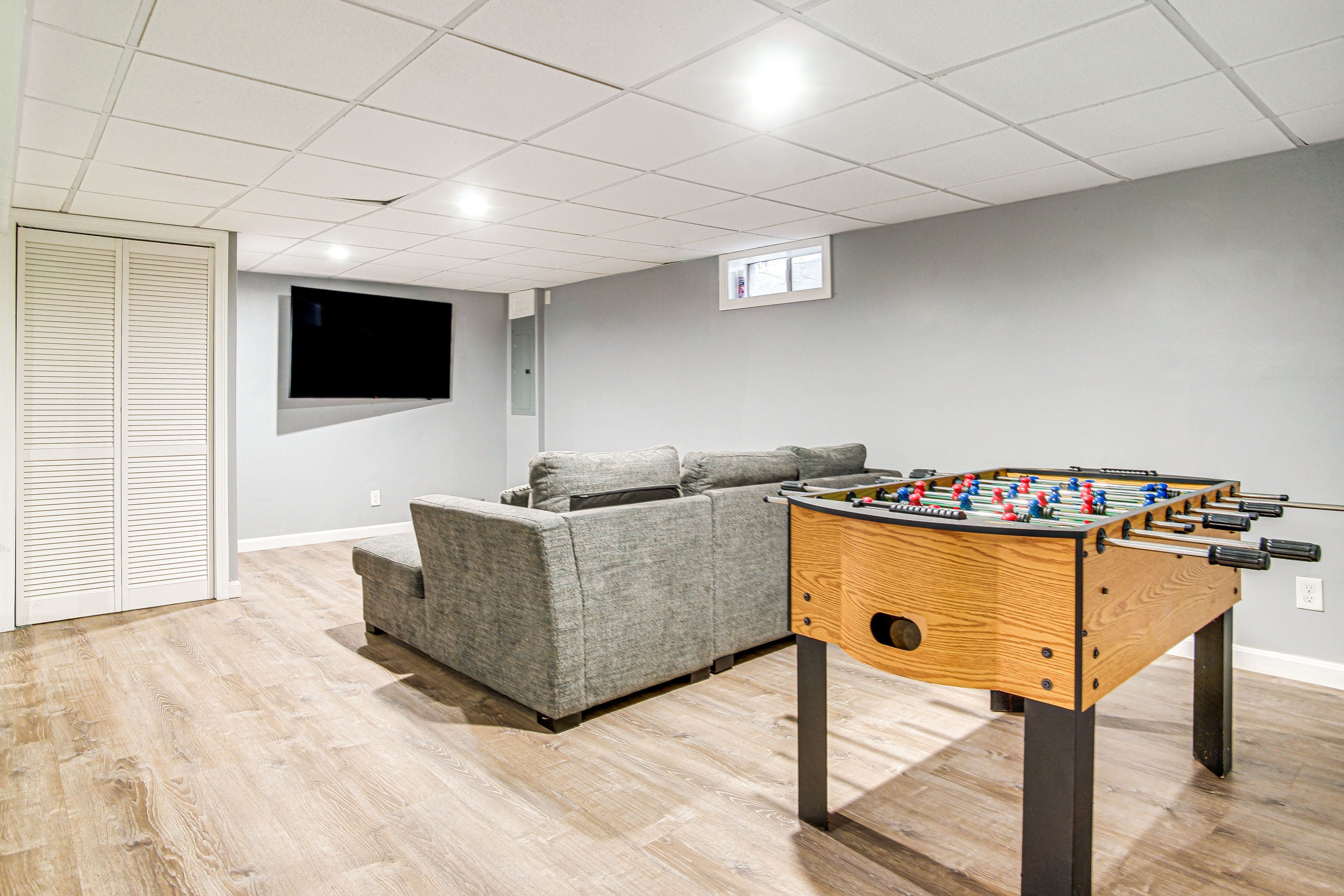 Game Room | Basement Level | Queen Sleeper Sofa | Smart TV | Foosball Table