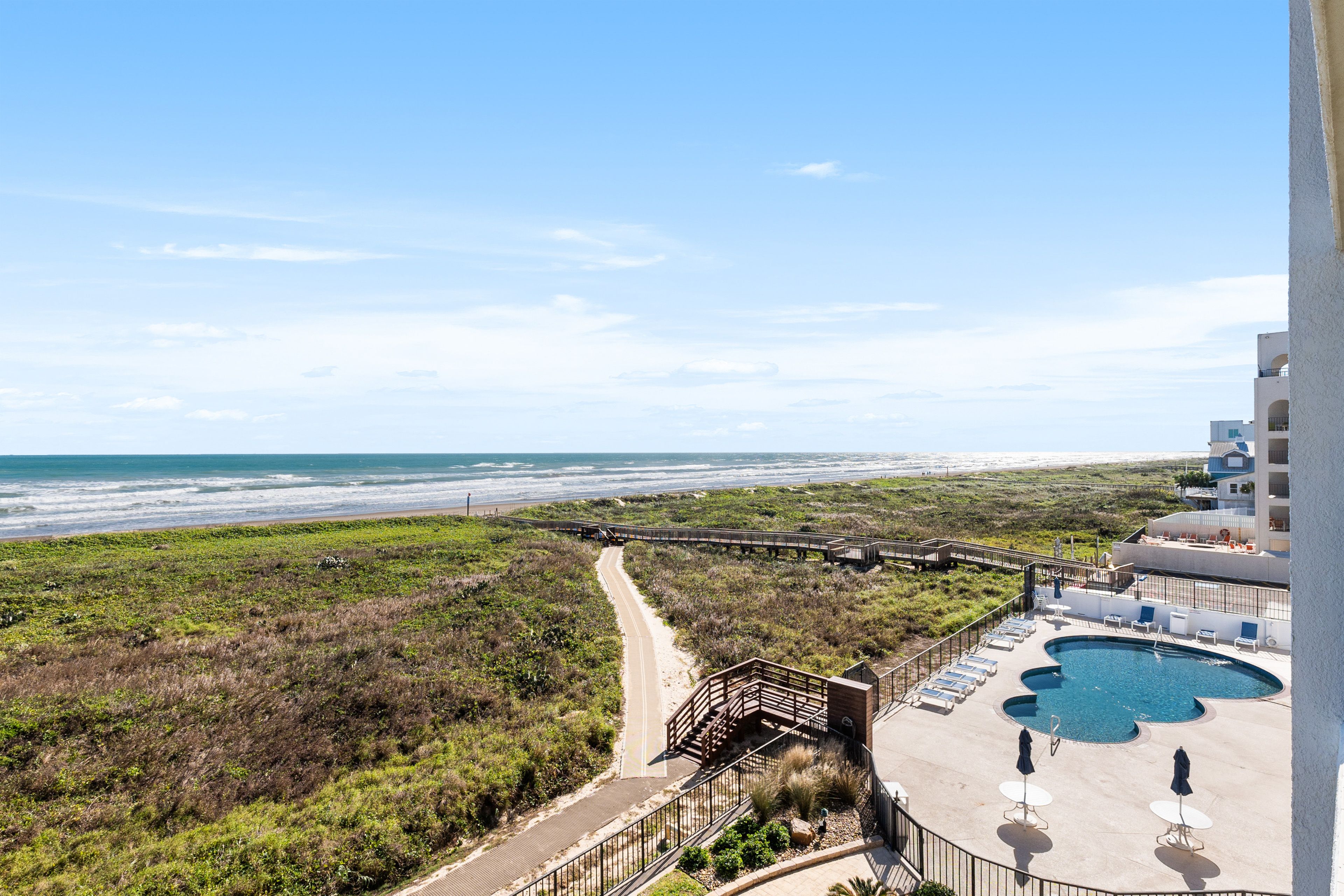 Seville Condos | Community Pool & Beach Access