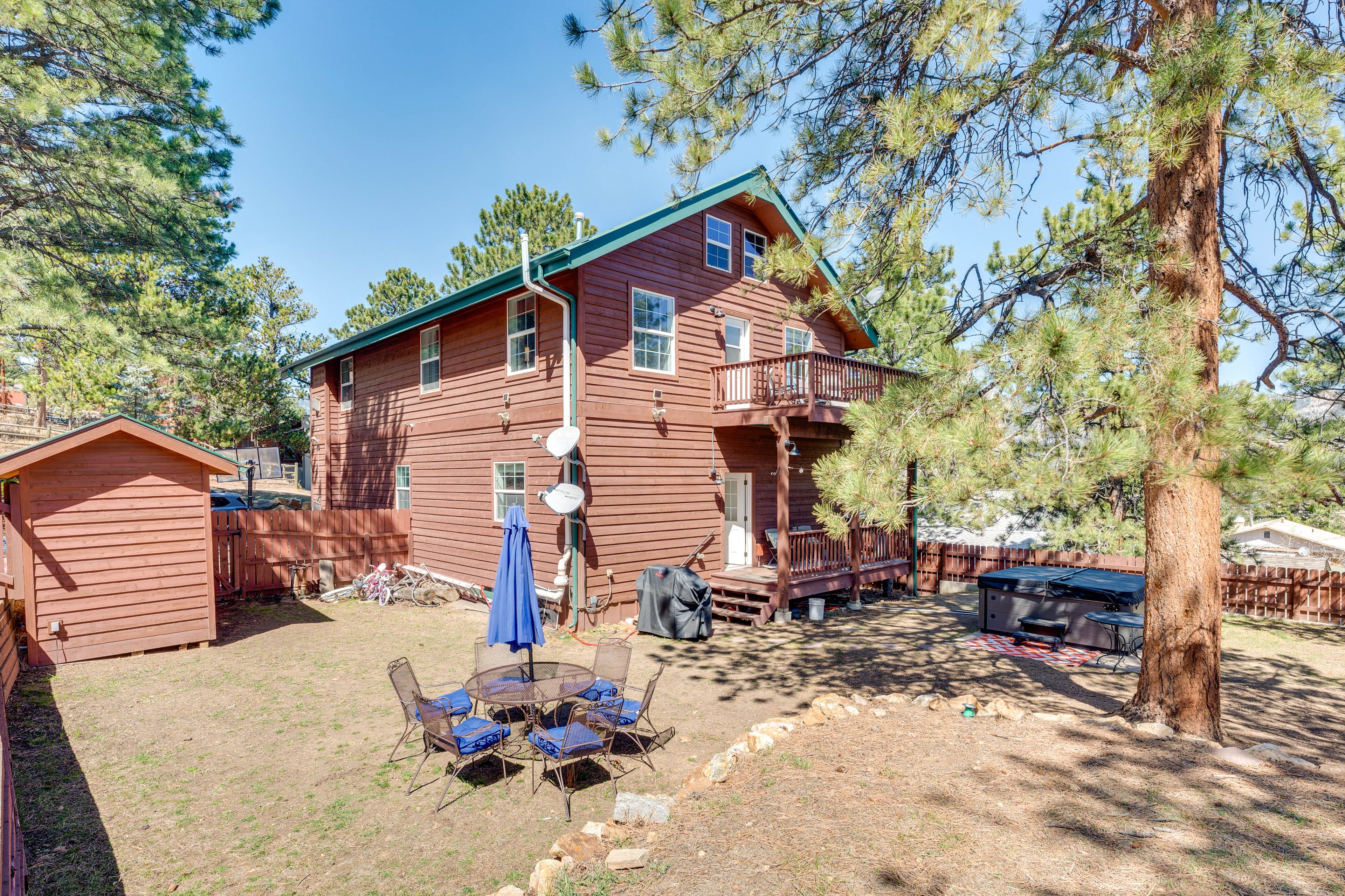 Backyard | Outdoor Dining Area | Private Hot Tub