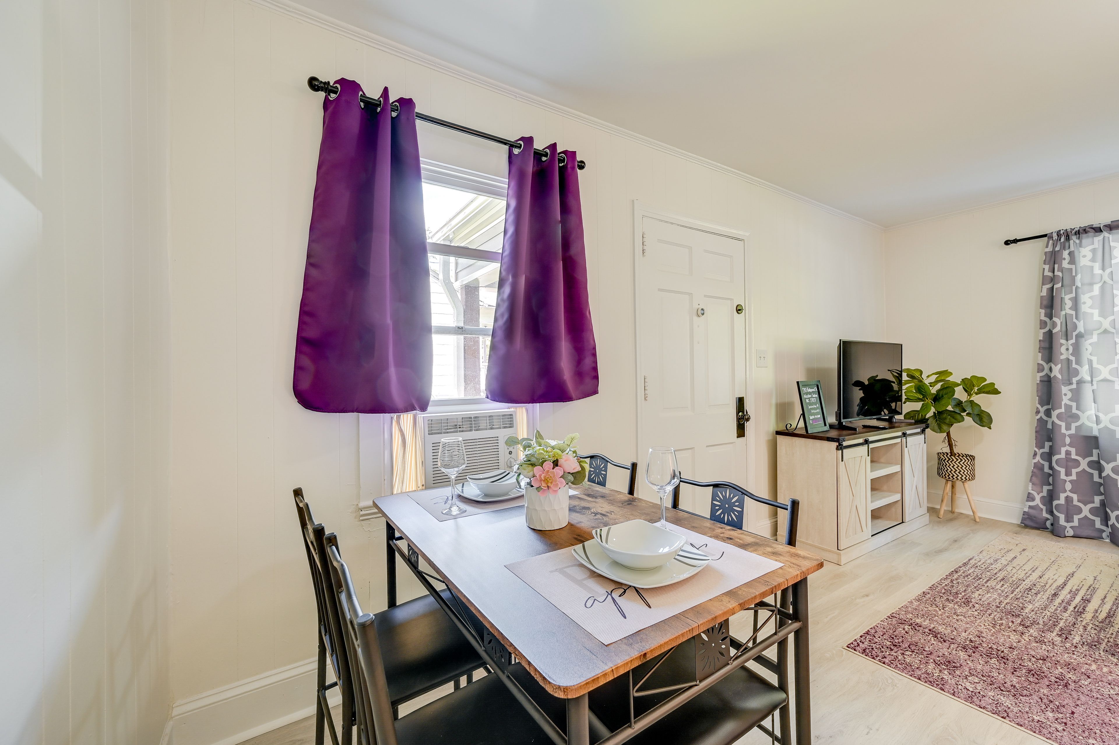 Dining Area | Window A/C Unit | Dishware & Flatware Provided