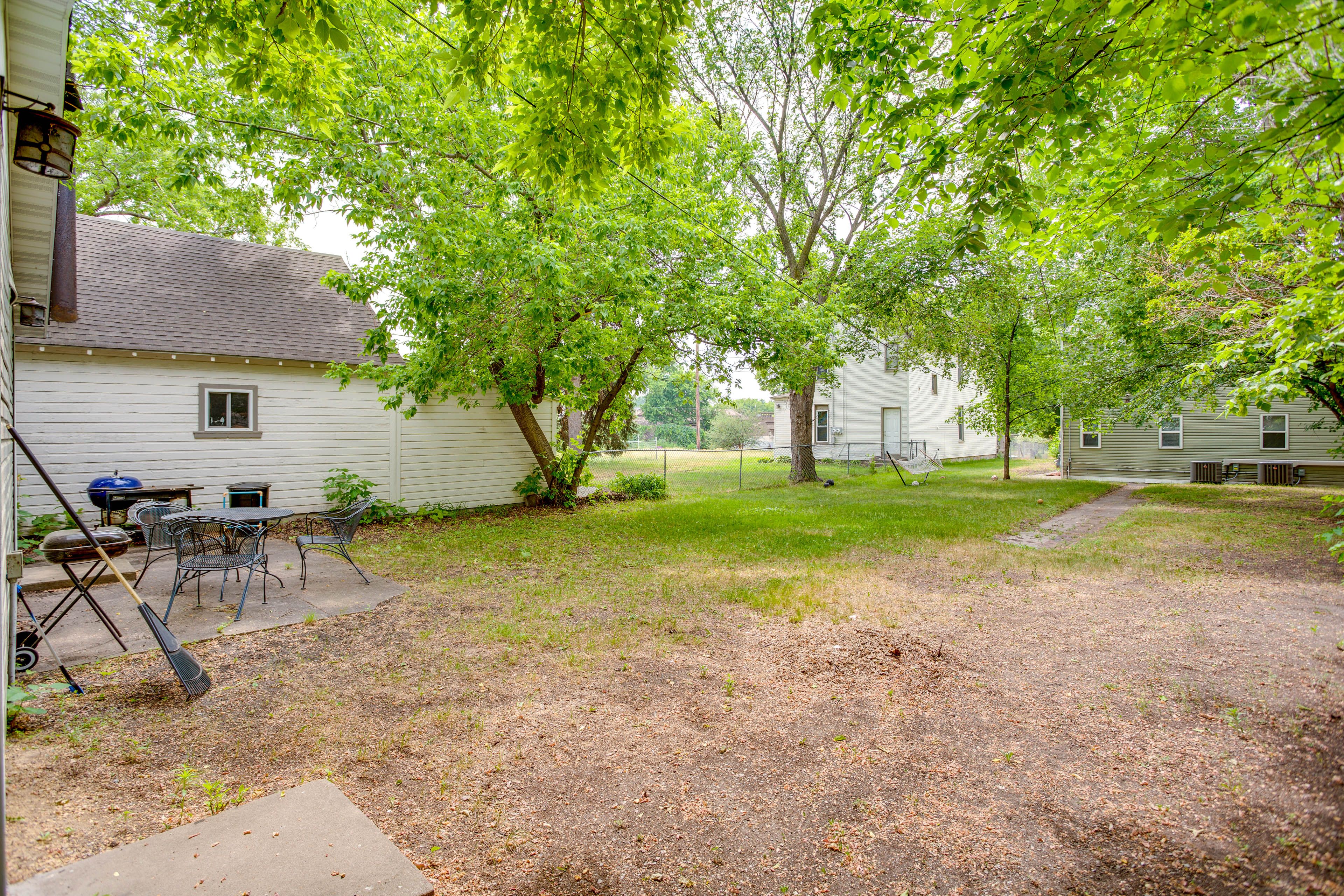 House Exterior | Shared Furnished Patio | Shared Dining Area & Charcoal Grills