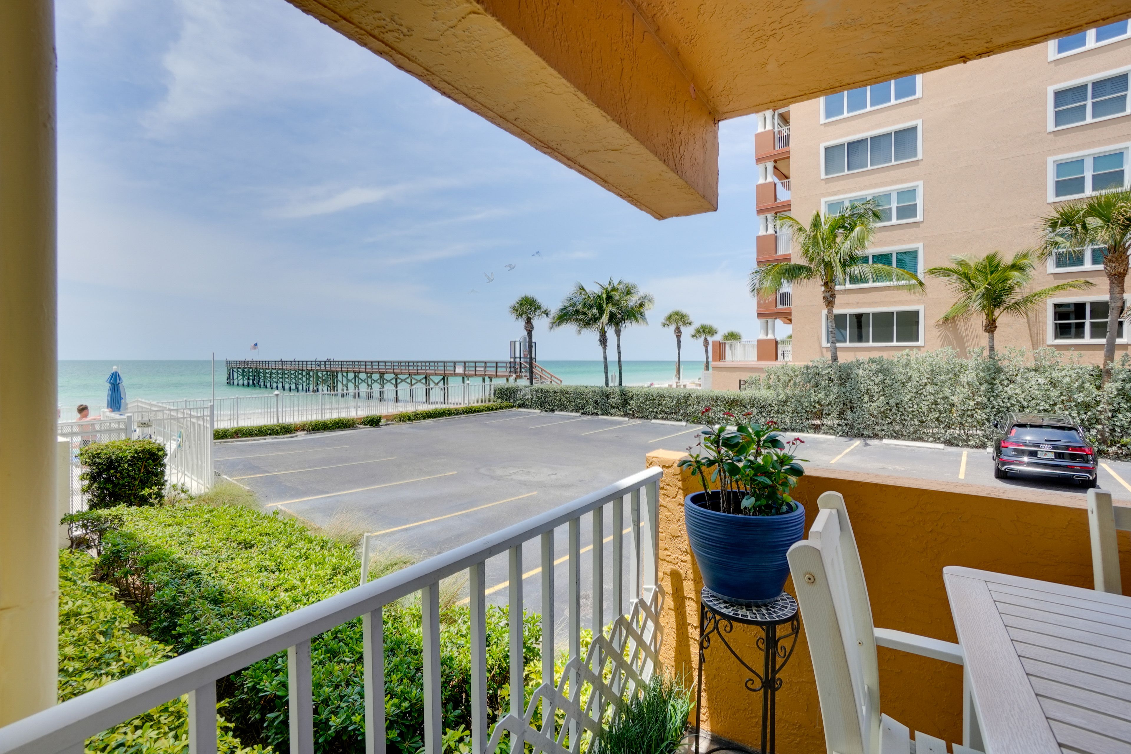 Private Balcony | Outdoor Dining Area | Surface Lot (2 Vehicles)