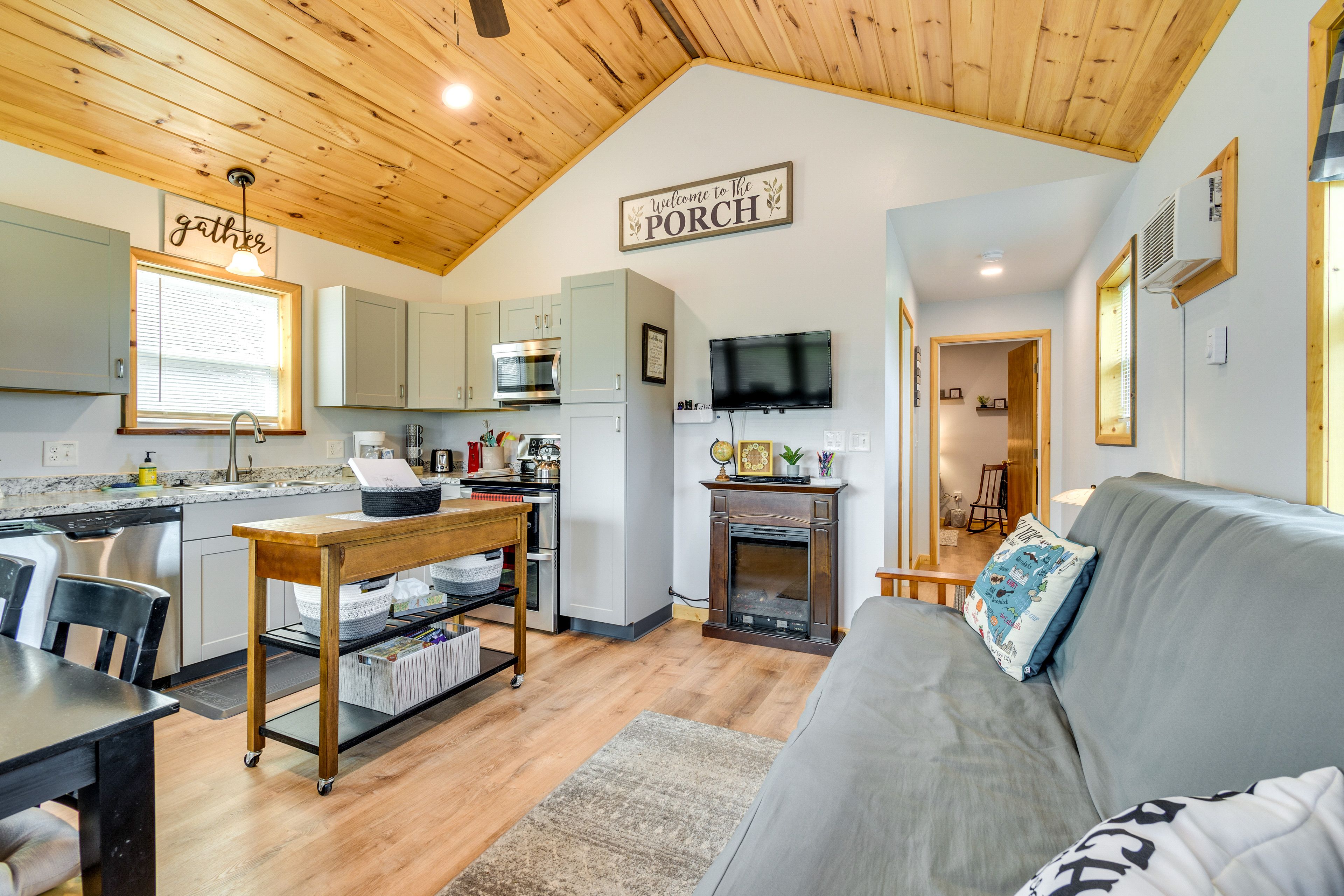 Living Room | Full Futon | Smart TV | Electric Fireplace | Ceiling Fans