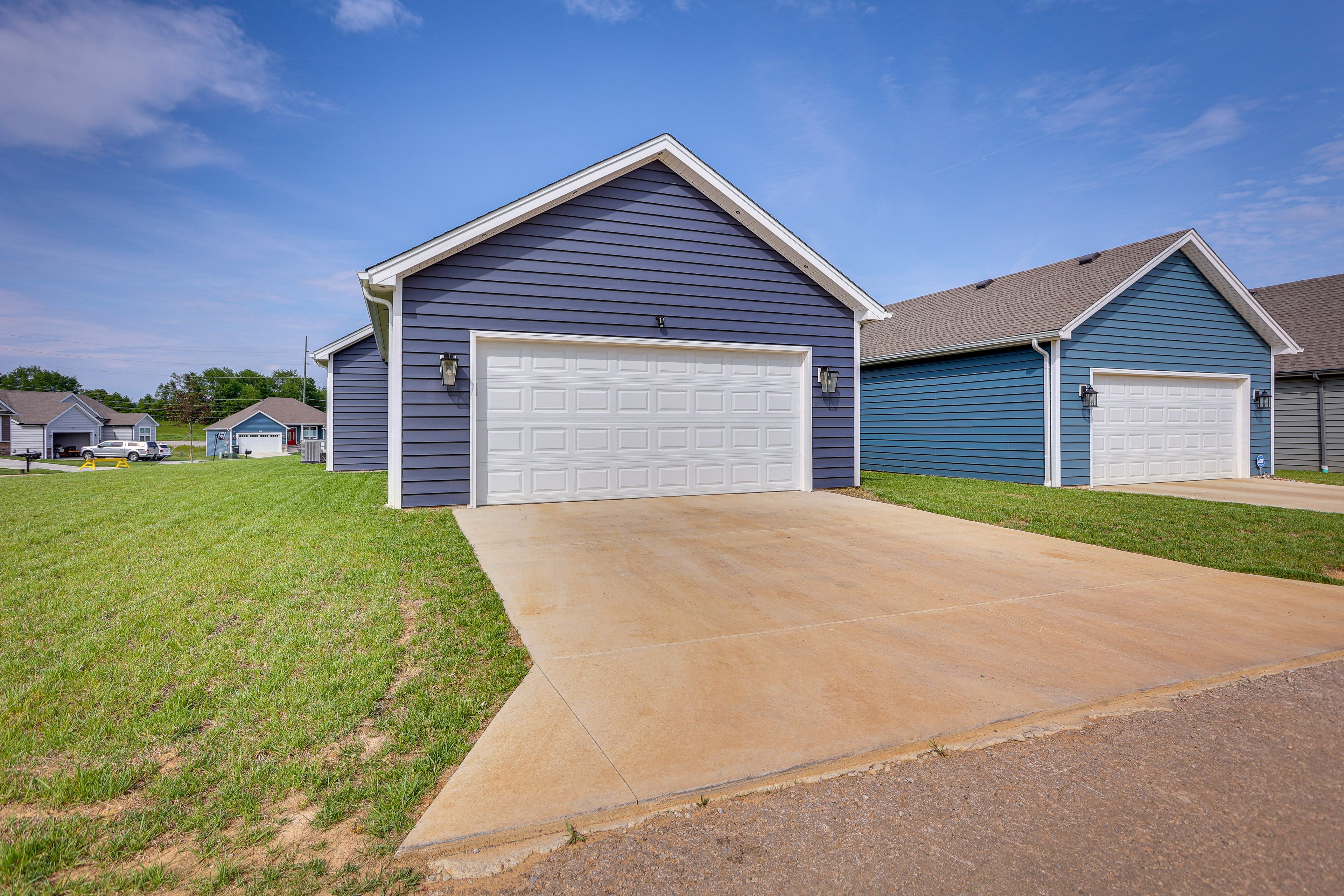 Parking | Garage (2 Vehicles) | Driveway (2 Vehicles) | EV Charging Station