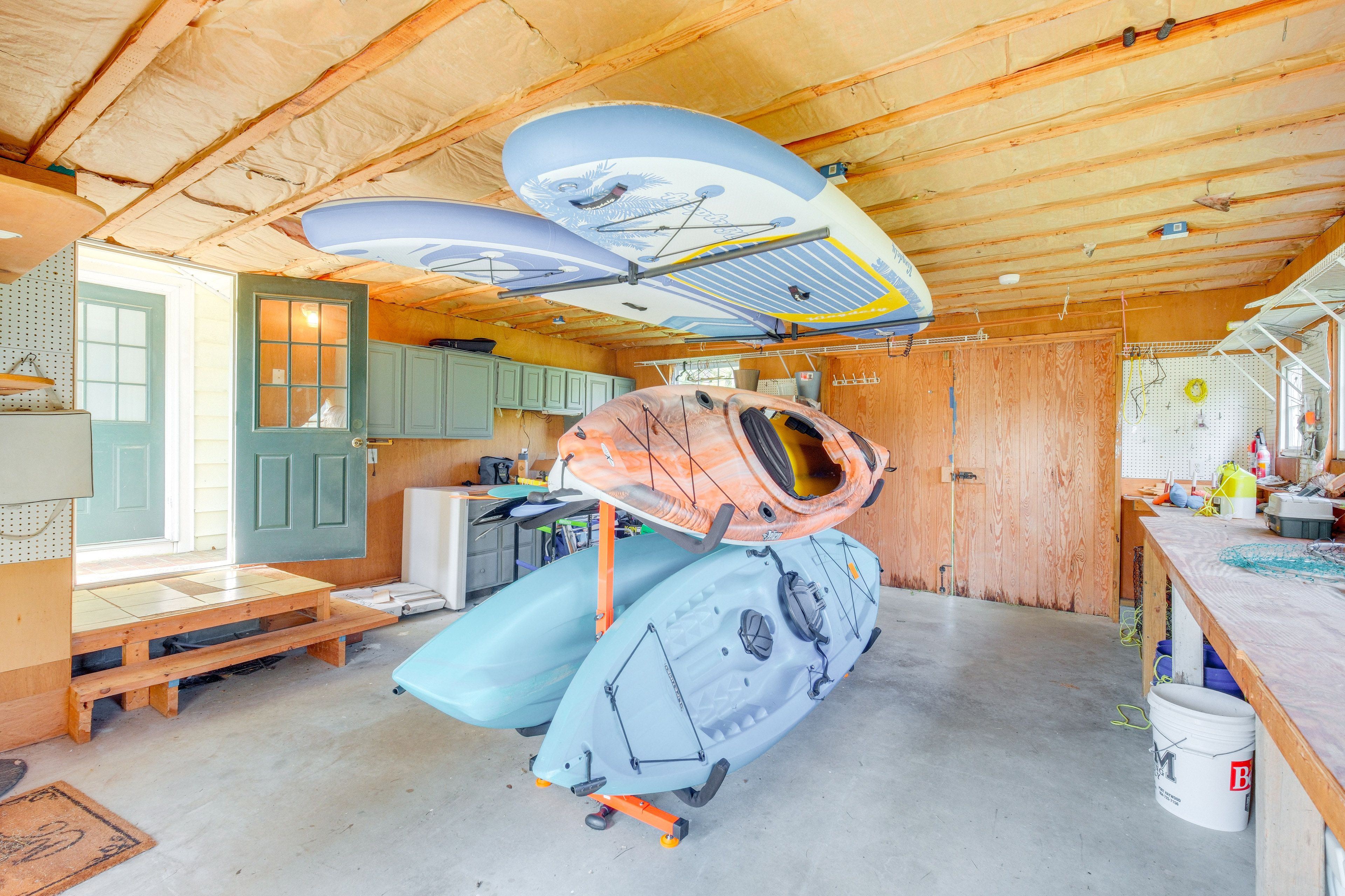 Garage | Kayaks | Paddle Boards | Life Vests | Yard Games