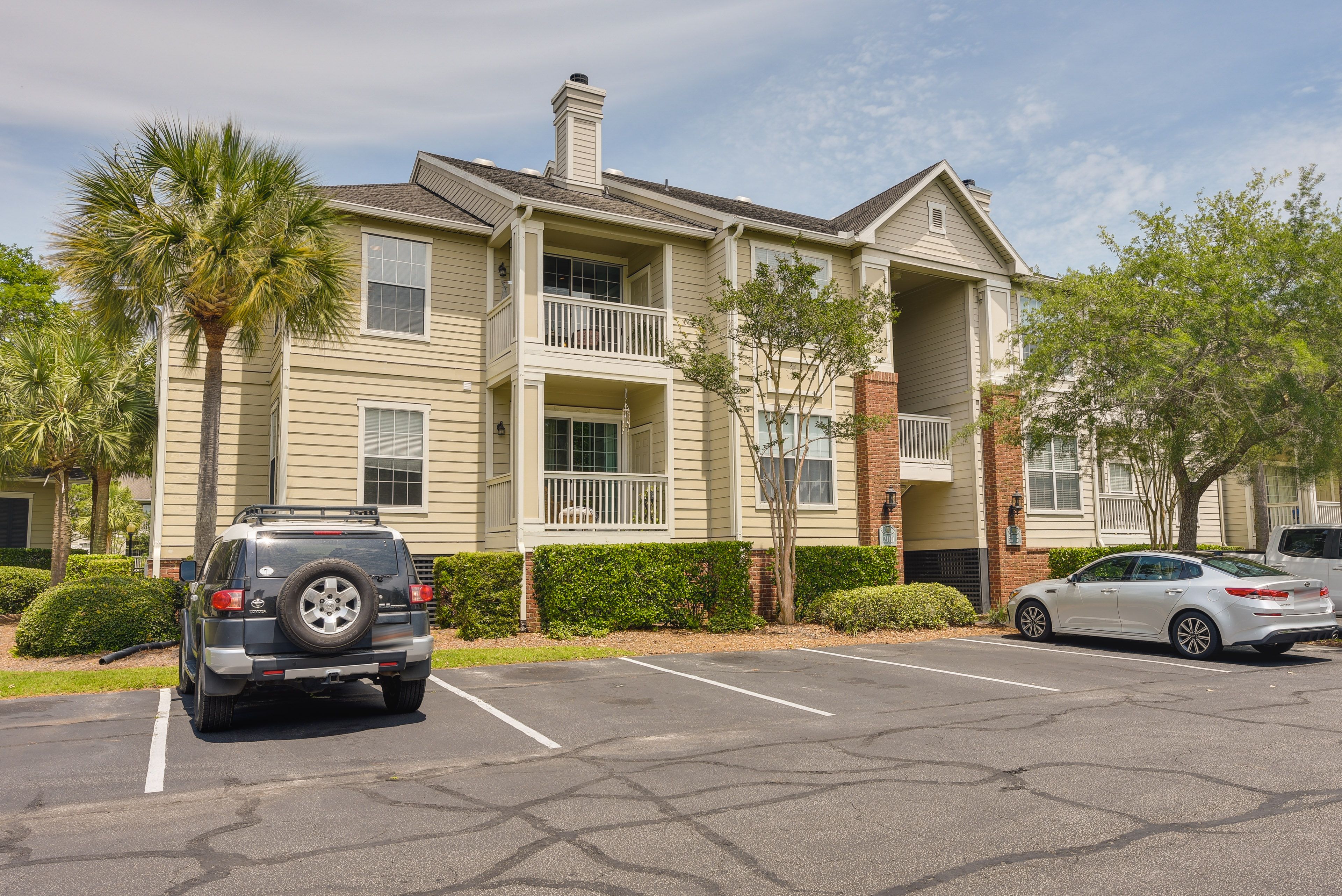 Condo Exterior | Parking | Community Lot (4 Vehicles)
