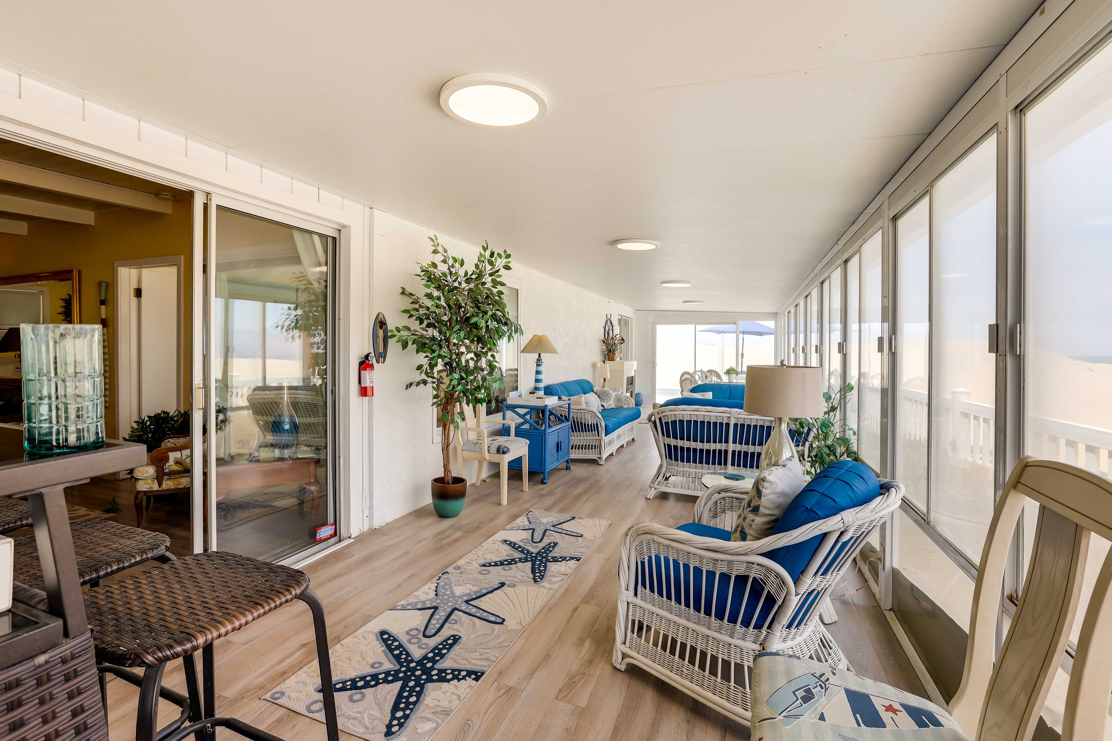 Sunroom | Electric Fireplace | Sand Dune Views
