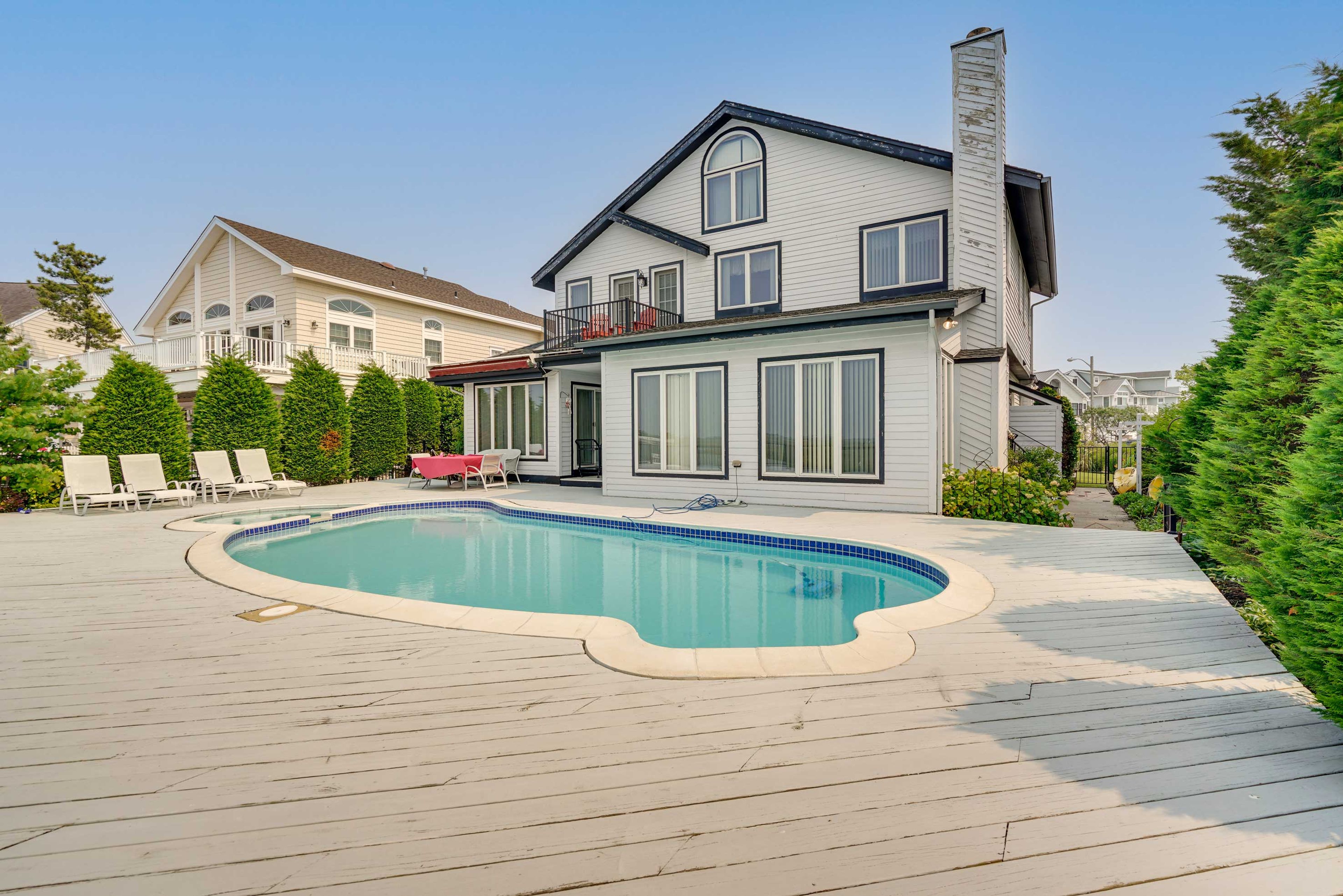 Back Deck | Outdoor Dining Area | Pool & Spa