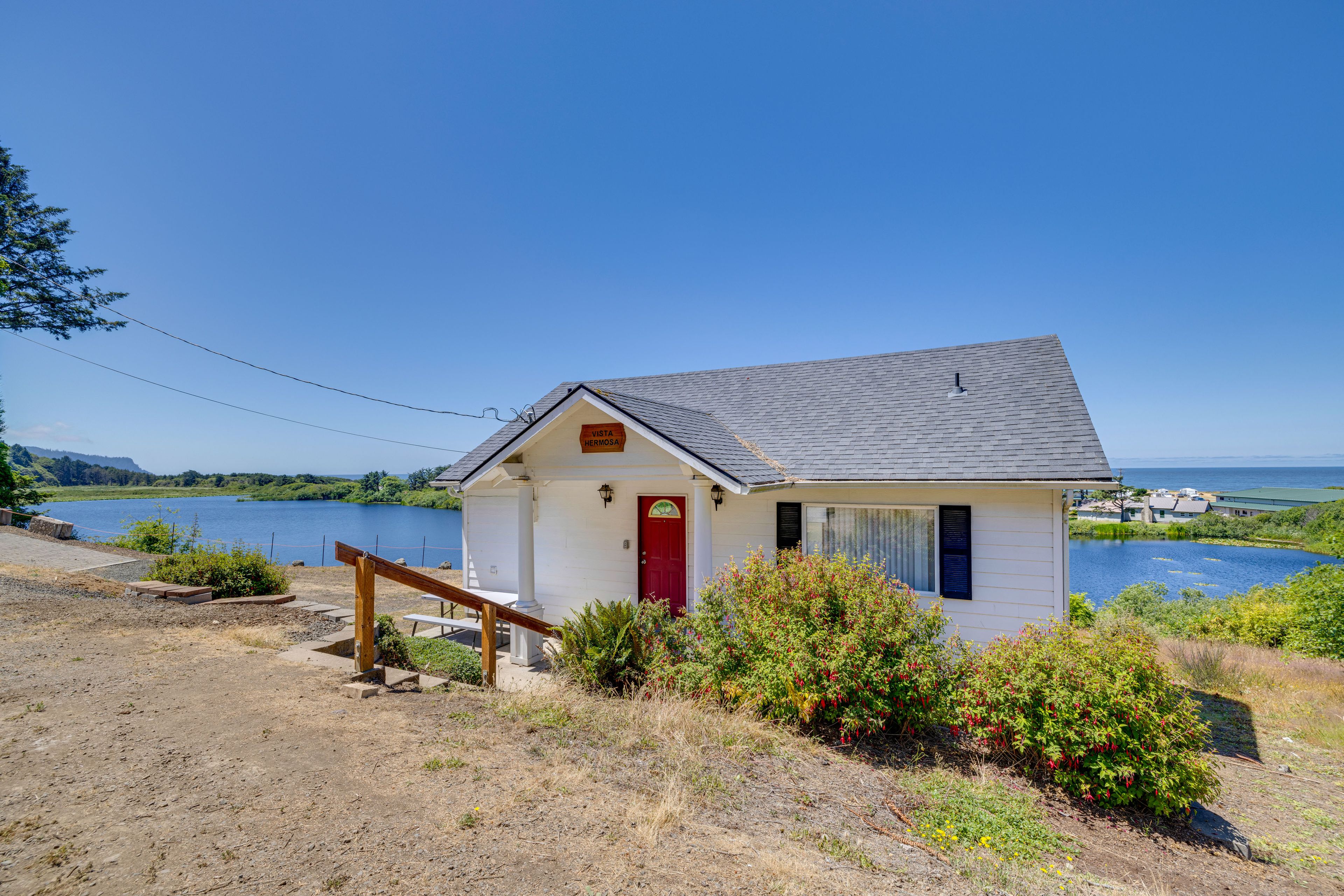 Home Exterior | 792 Sq Ft | Lakefront Views | Walk to Beaches