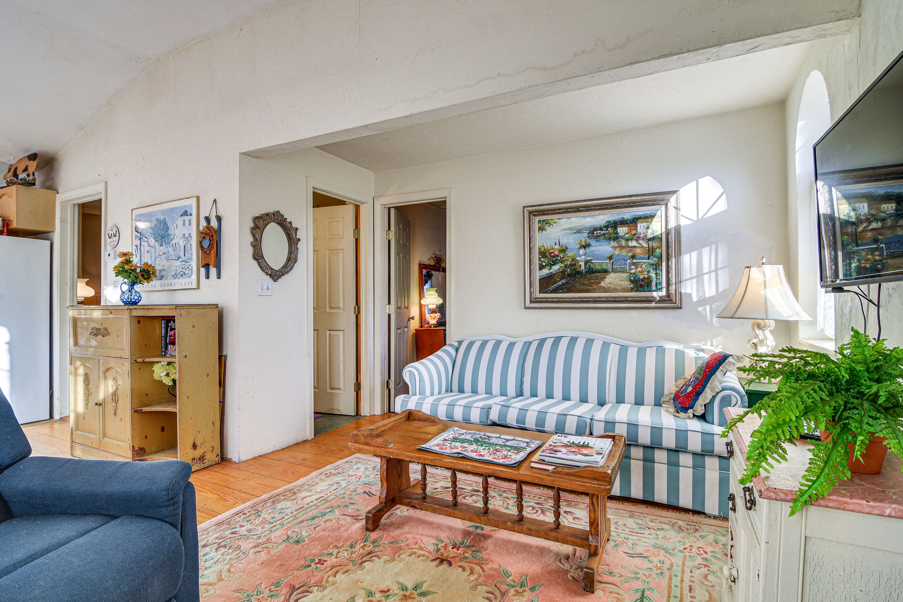 Living Room | Fireplace | Queen Sleeper Sofa | Window A/C Unit