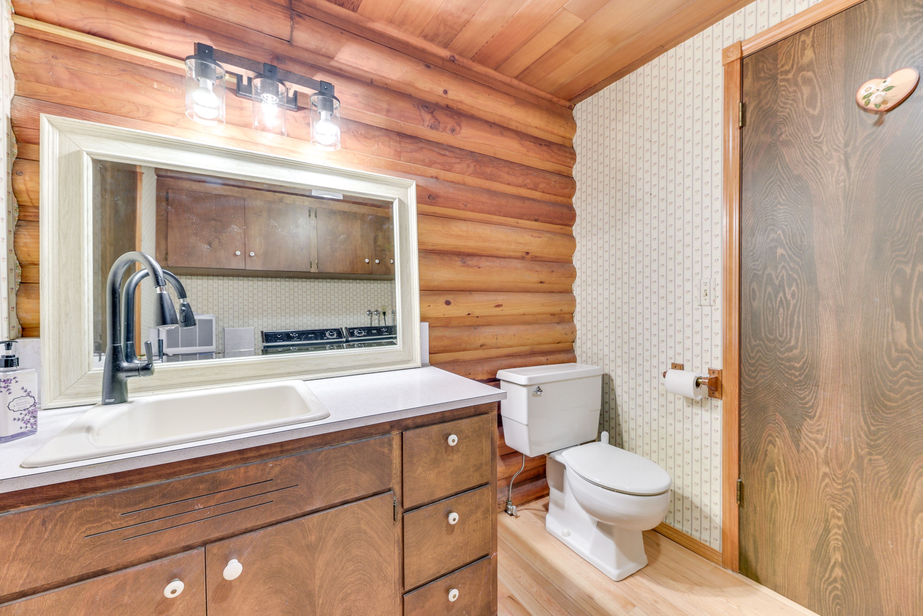 Half Bathroom | Washer & Dryer | 1st Floor