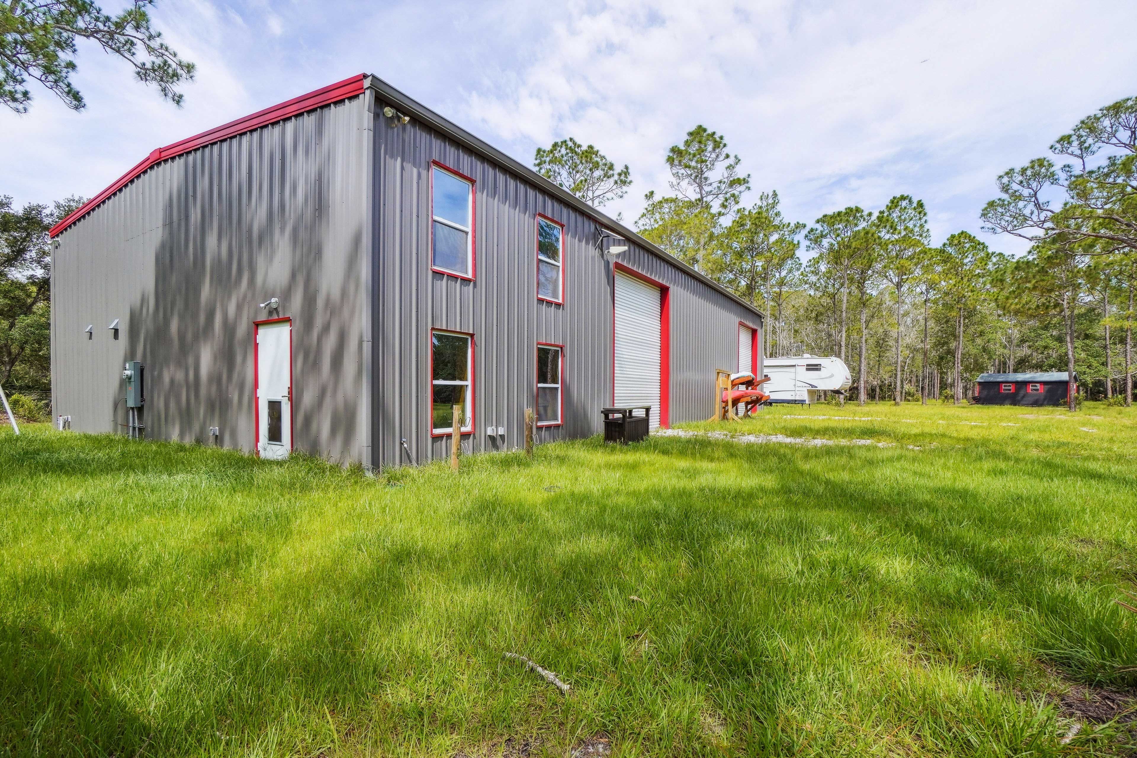 Exterior | Outdoor Shower | Fire Pit | Hammock | Kayaks Not Included