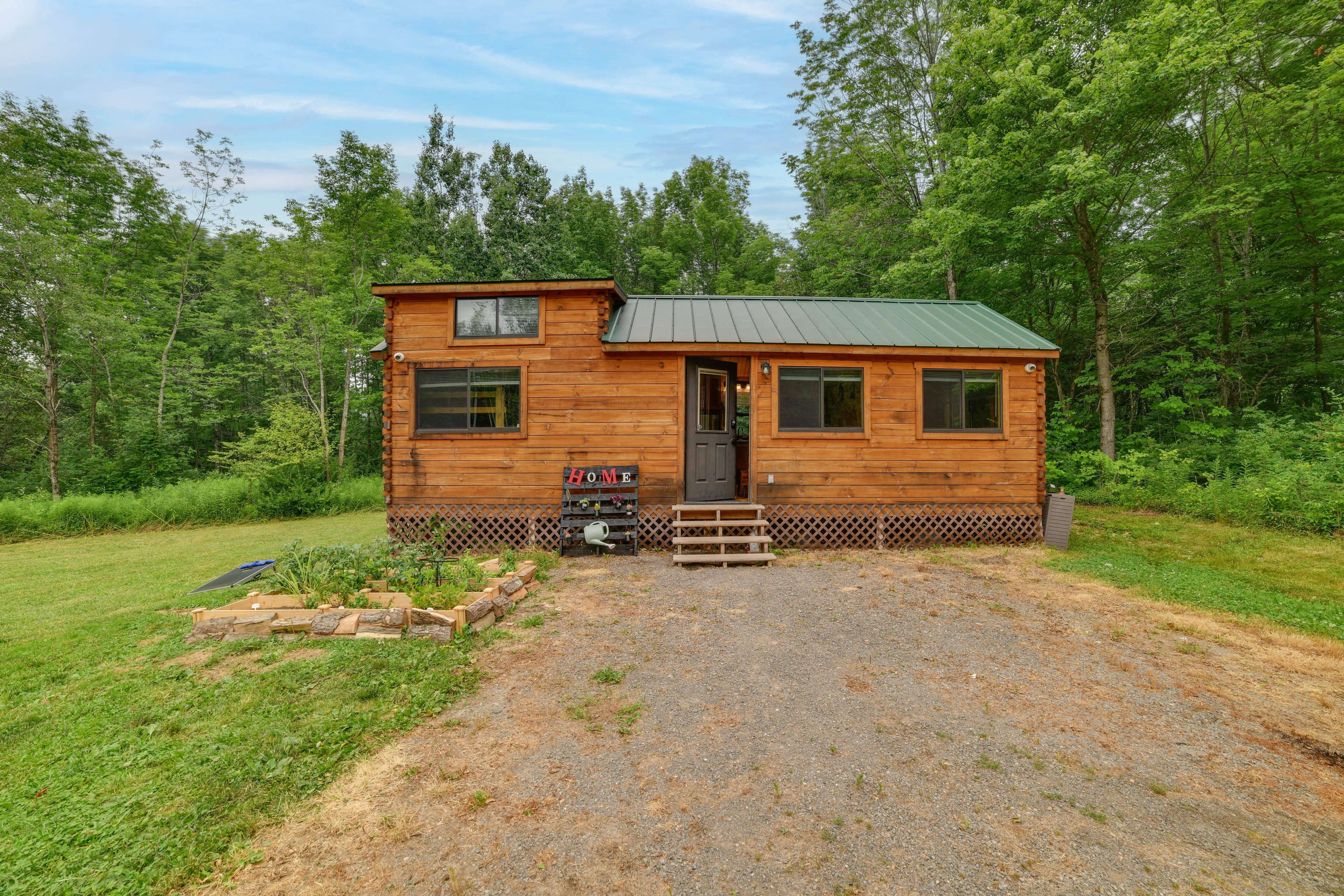 Cabin Exterior | Spacious Yard | Single-Story Home w/ Loft