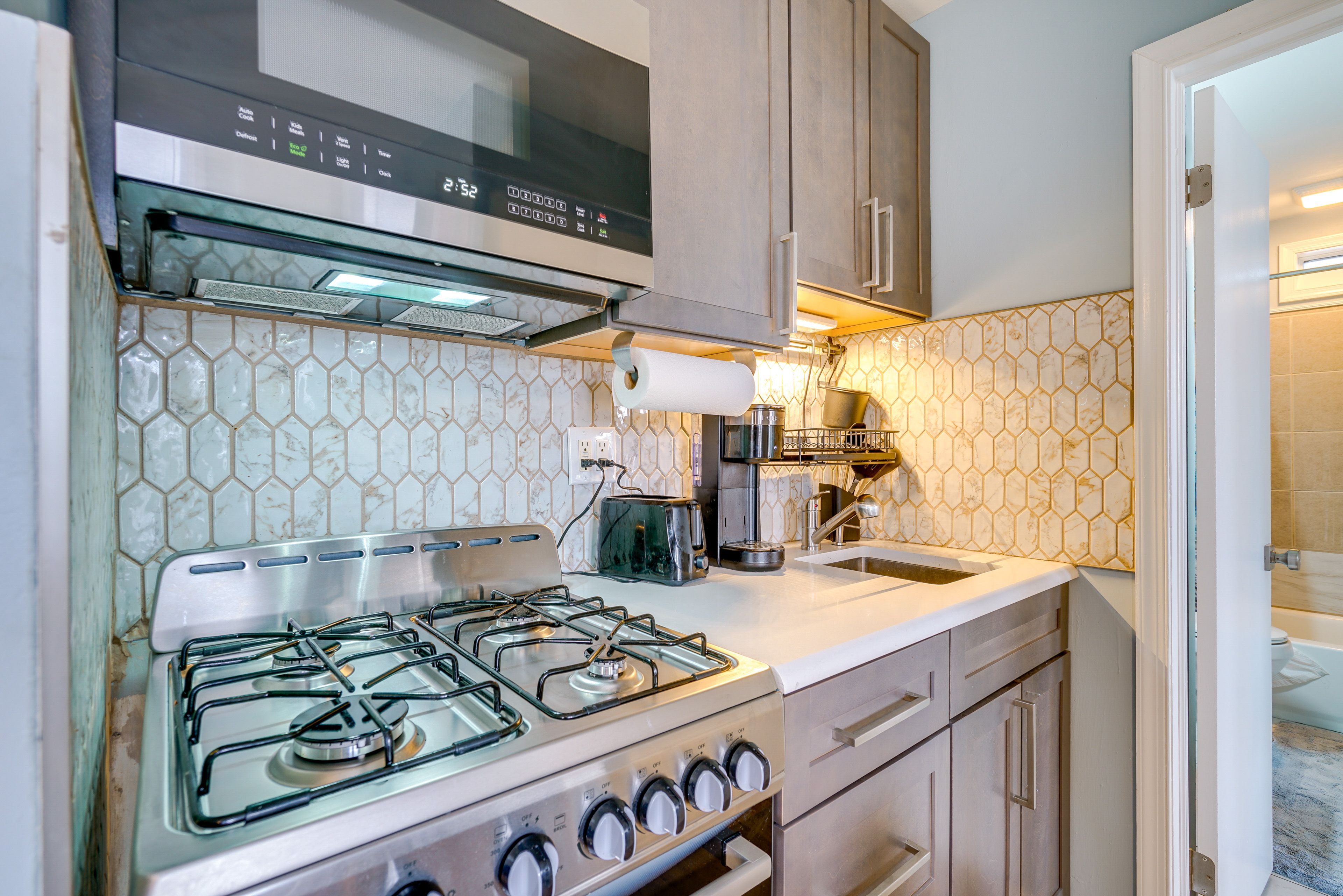 Kitchenette | Keurig Coffee Maker | Trash Bags & Paper Towels