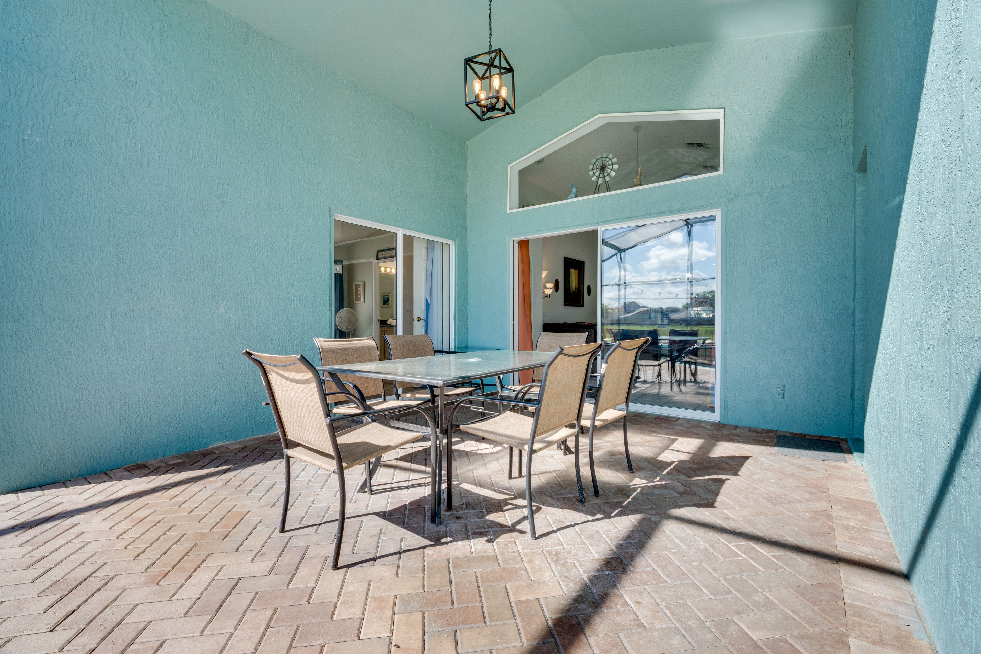 Screened Lanai | Dining Area | Private Pool (Heated w/ Fee) | Hot Tub
