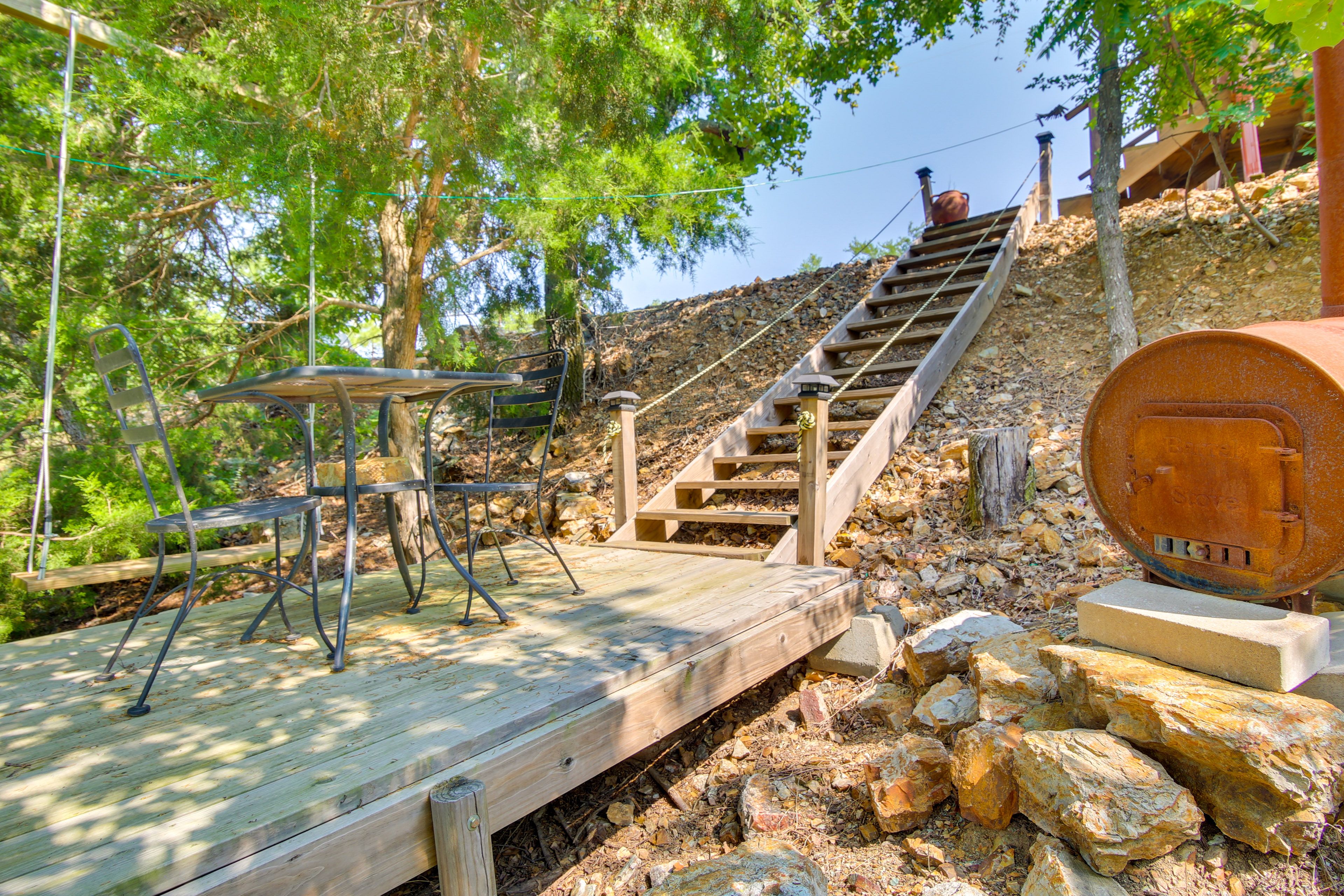 Patio | Outdoor Dining Area | Chiminea | Swing