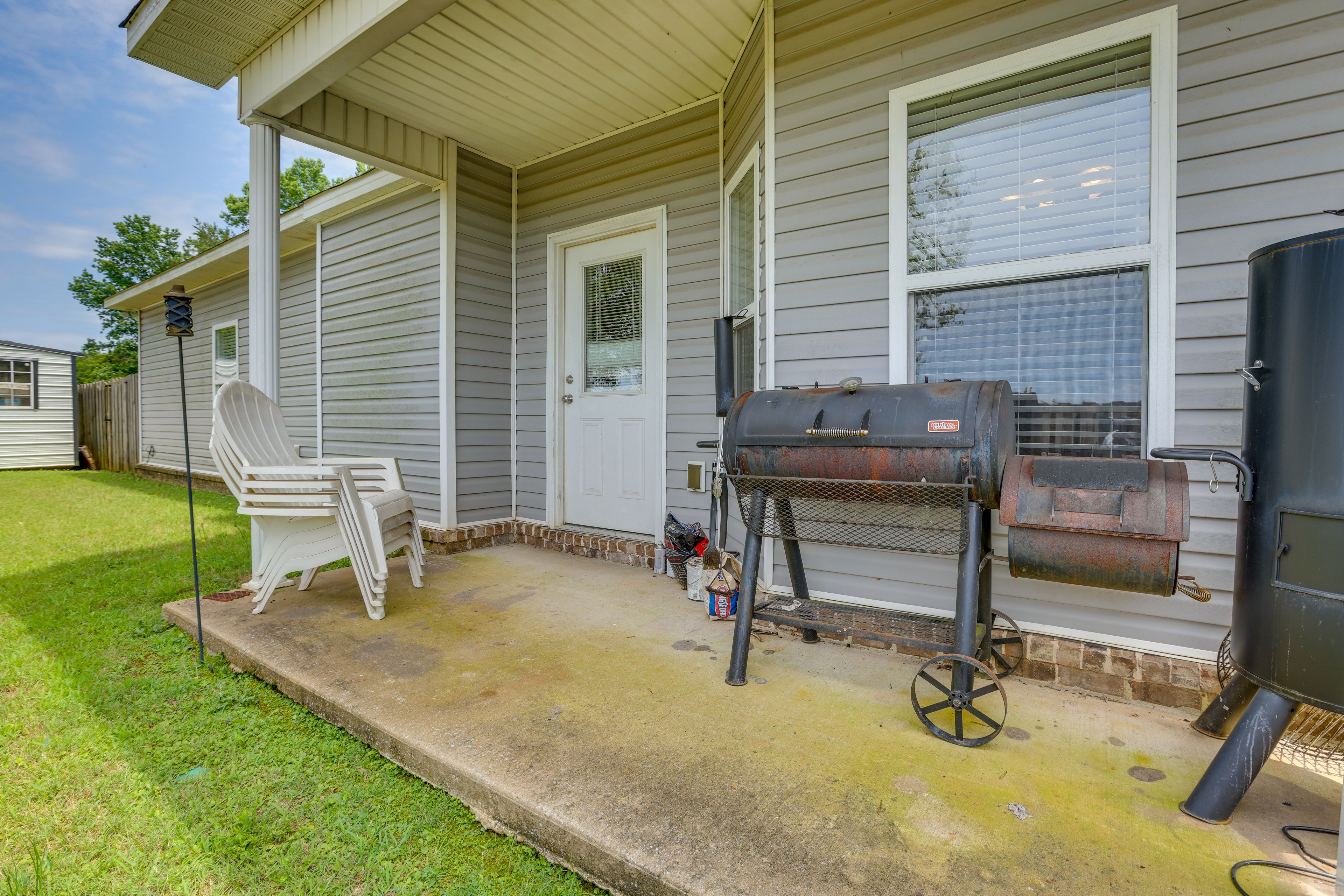 Covered Patio | Charcoal Grill | Private Fenced Backyard