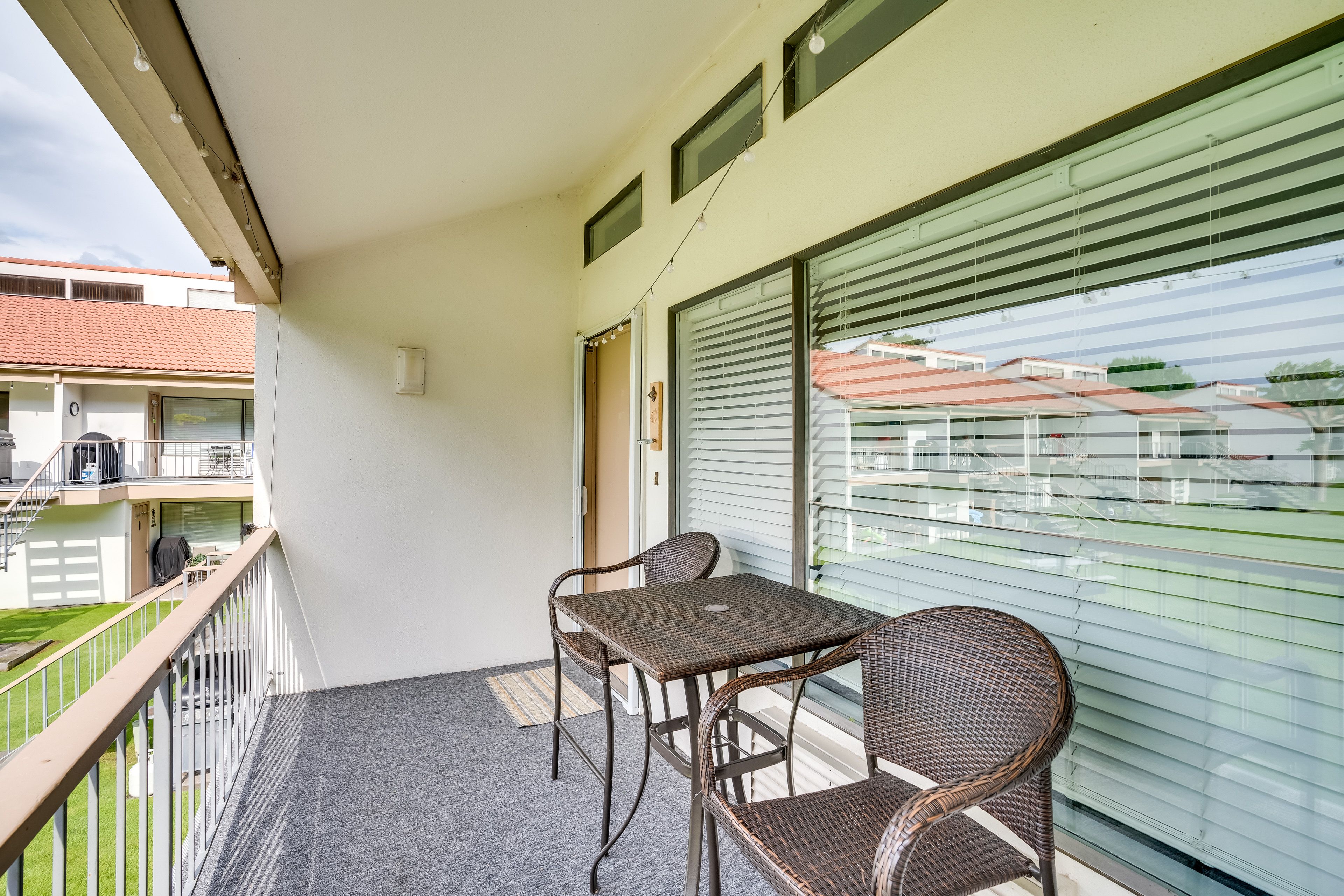 Private Balcony | Seating | Charcoal Grill