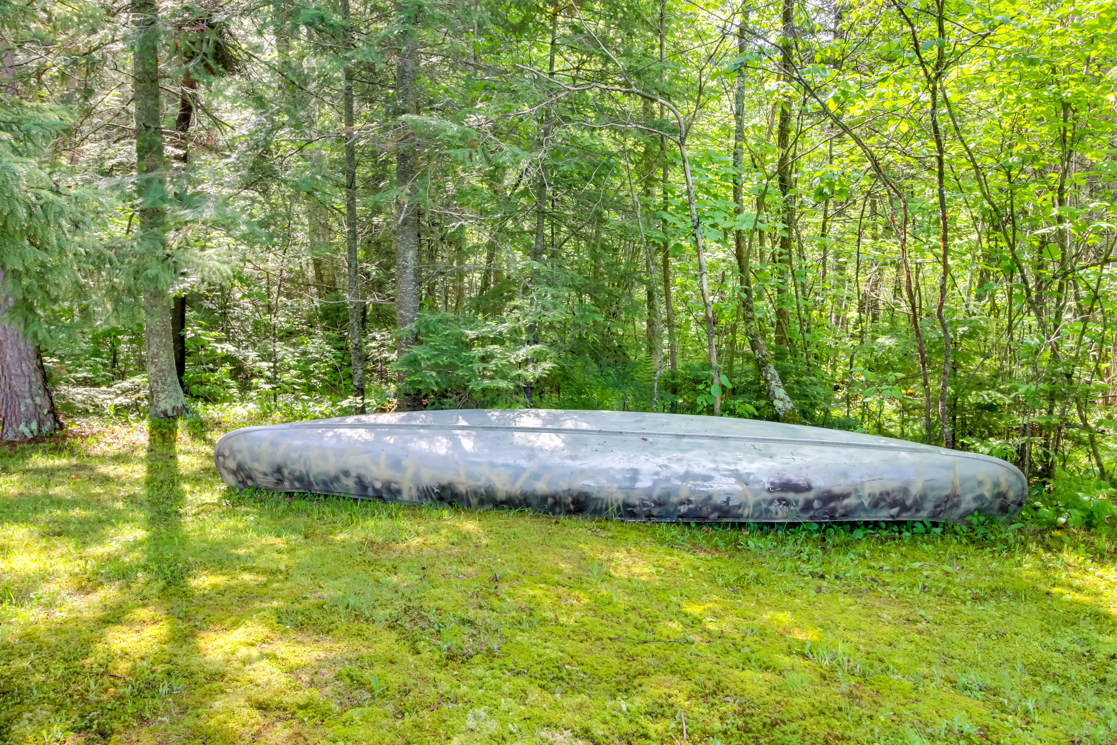 Cabin Exterior | Canoe | Life Vests