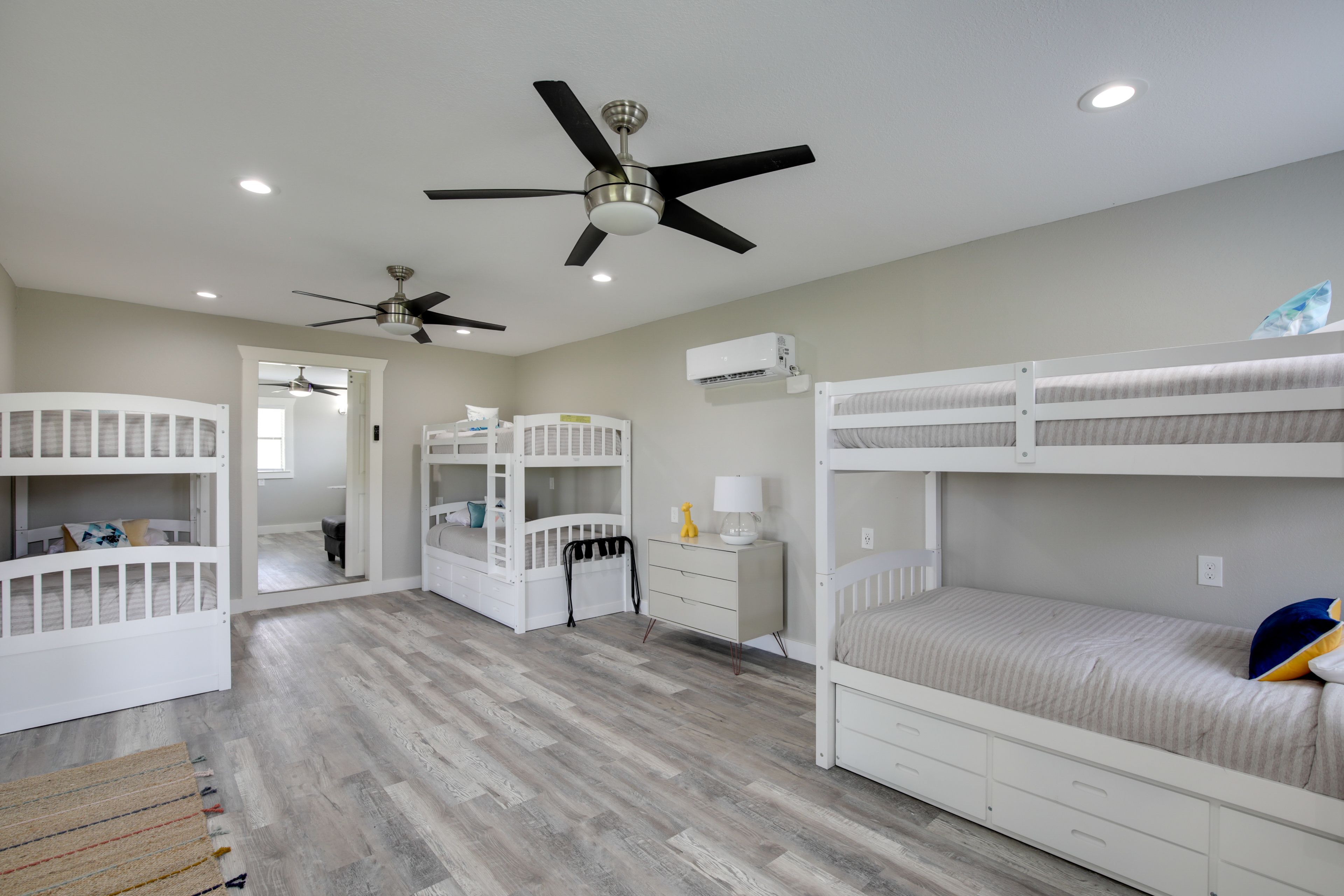 Bedroom 5 (Guest House) | 1st Floor | 3 Twin Bunk Beds w/ Twin Trundles