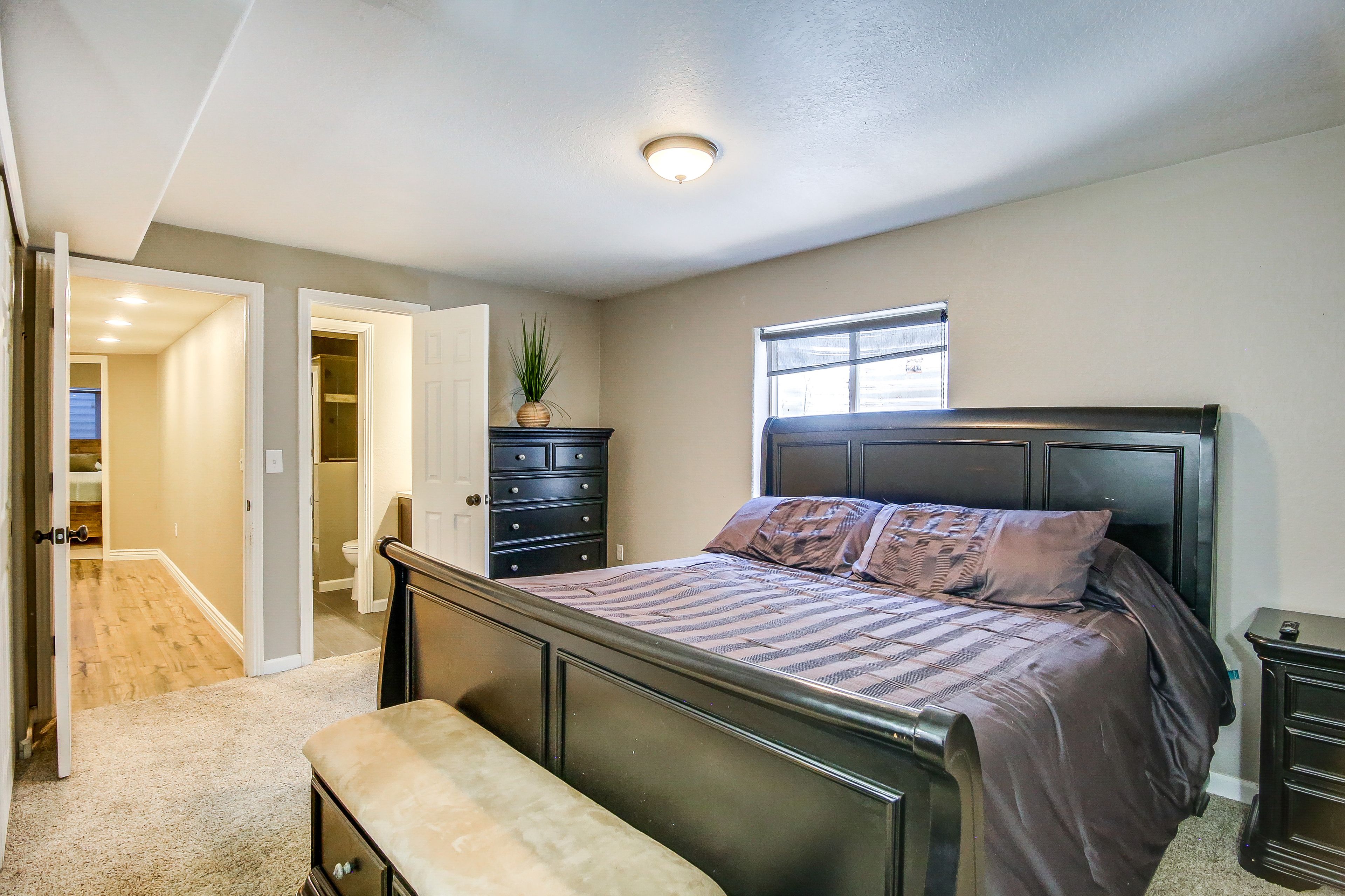 Bedroom 1 | King Bed | Linens Provided | Shared En-Suite Bathroom