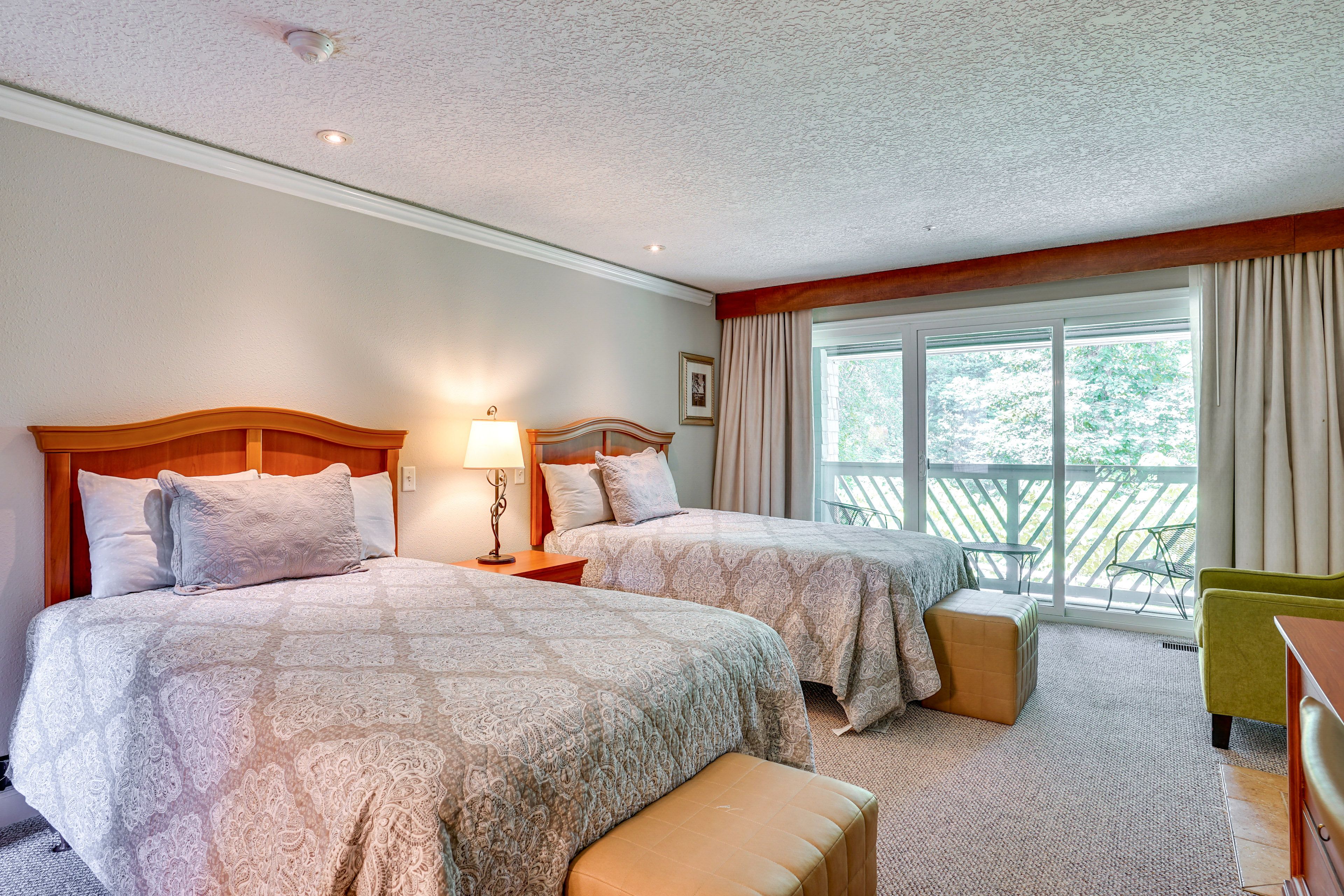 Bedroom 3 | 2 Queen Beds | Cable TV | Balcony Access | Desk Workspaces