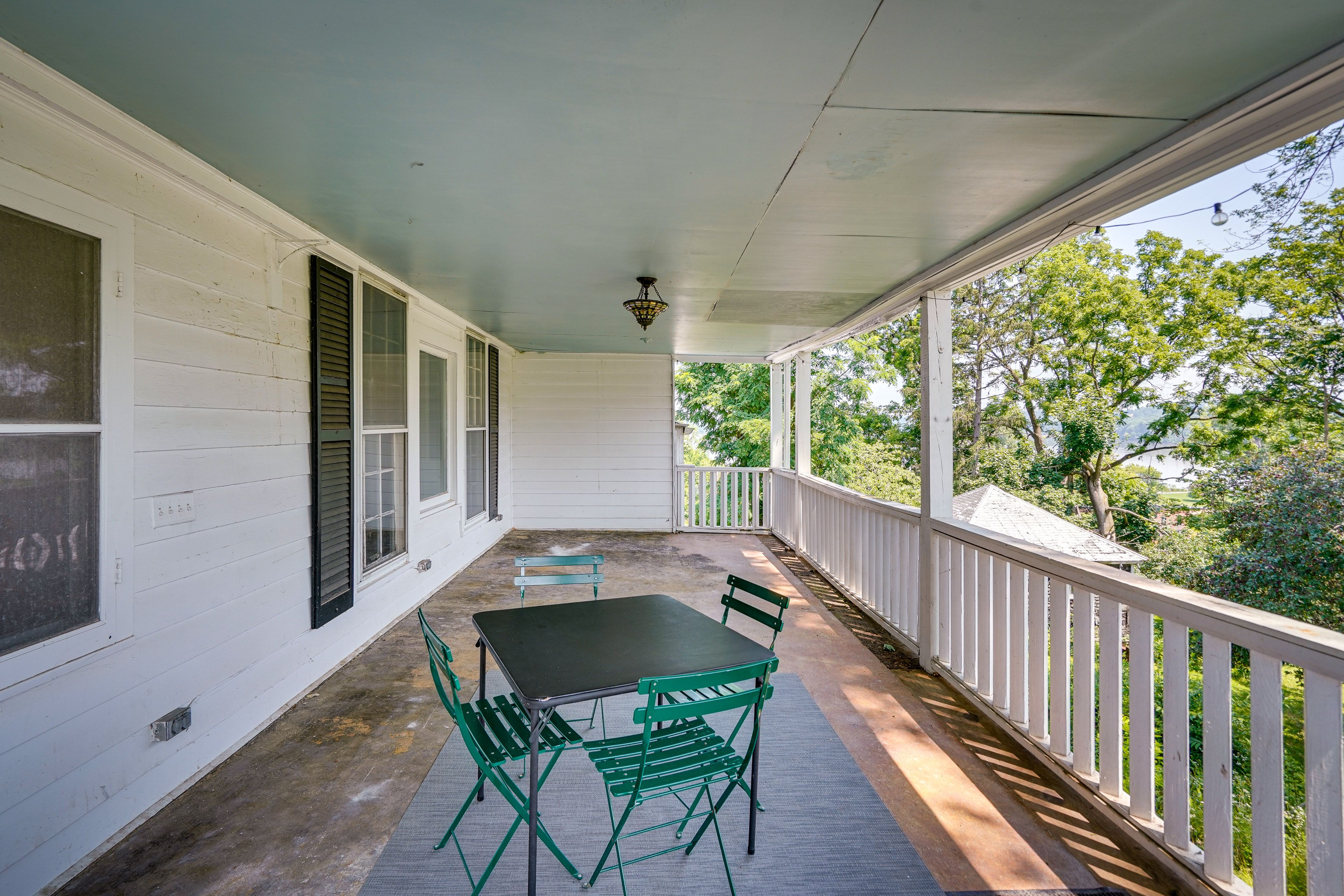 Balcony | Seating & Dining | Forested & Water Views