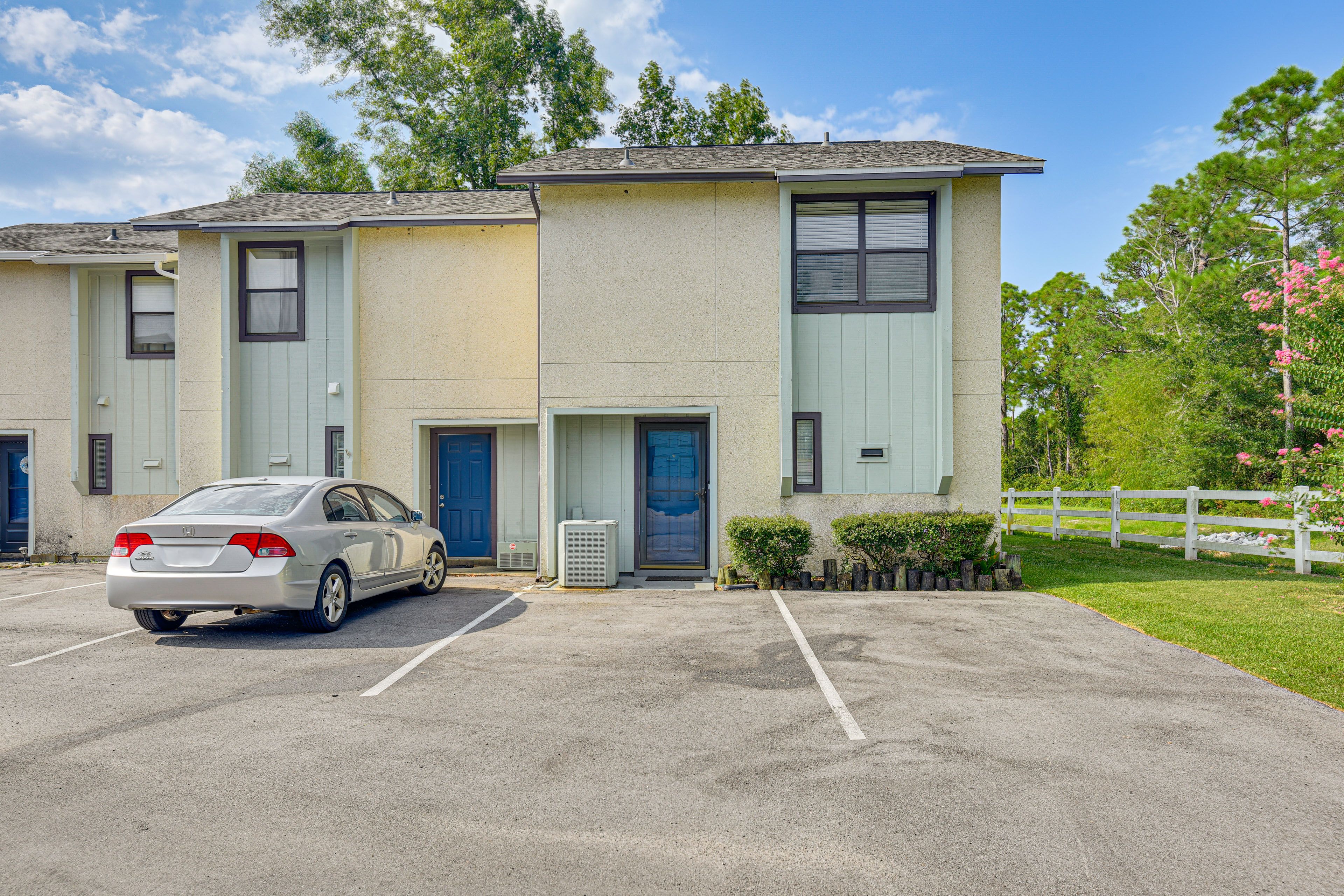 Townhome Exterior | Parking | Driveway (2 Vehicles)