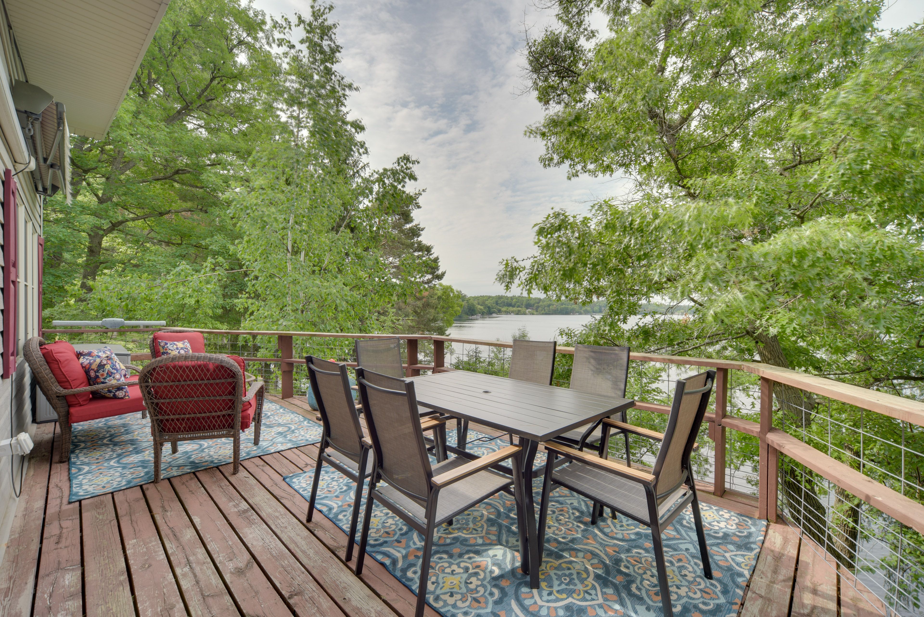Cabin Exterior | Furnished Deck | Dining Area | Lake Views