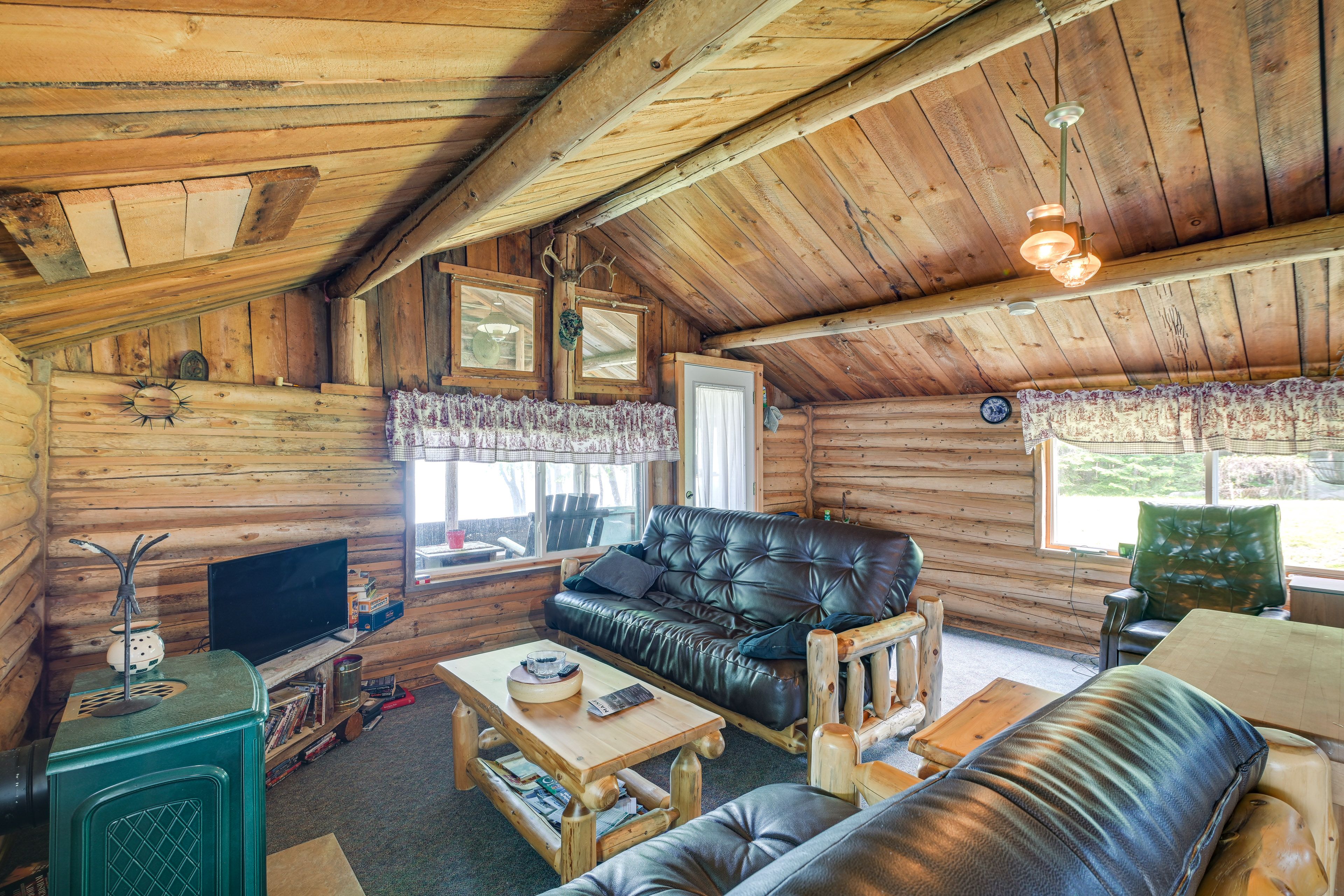Living Room | Full Futon | Smart TV | DVD Player w/ Video Library | Board Games