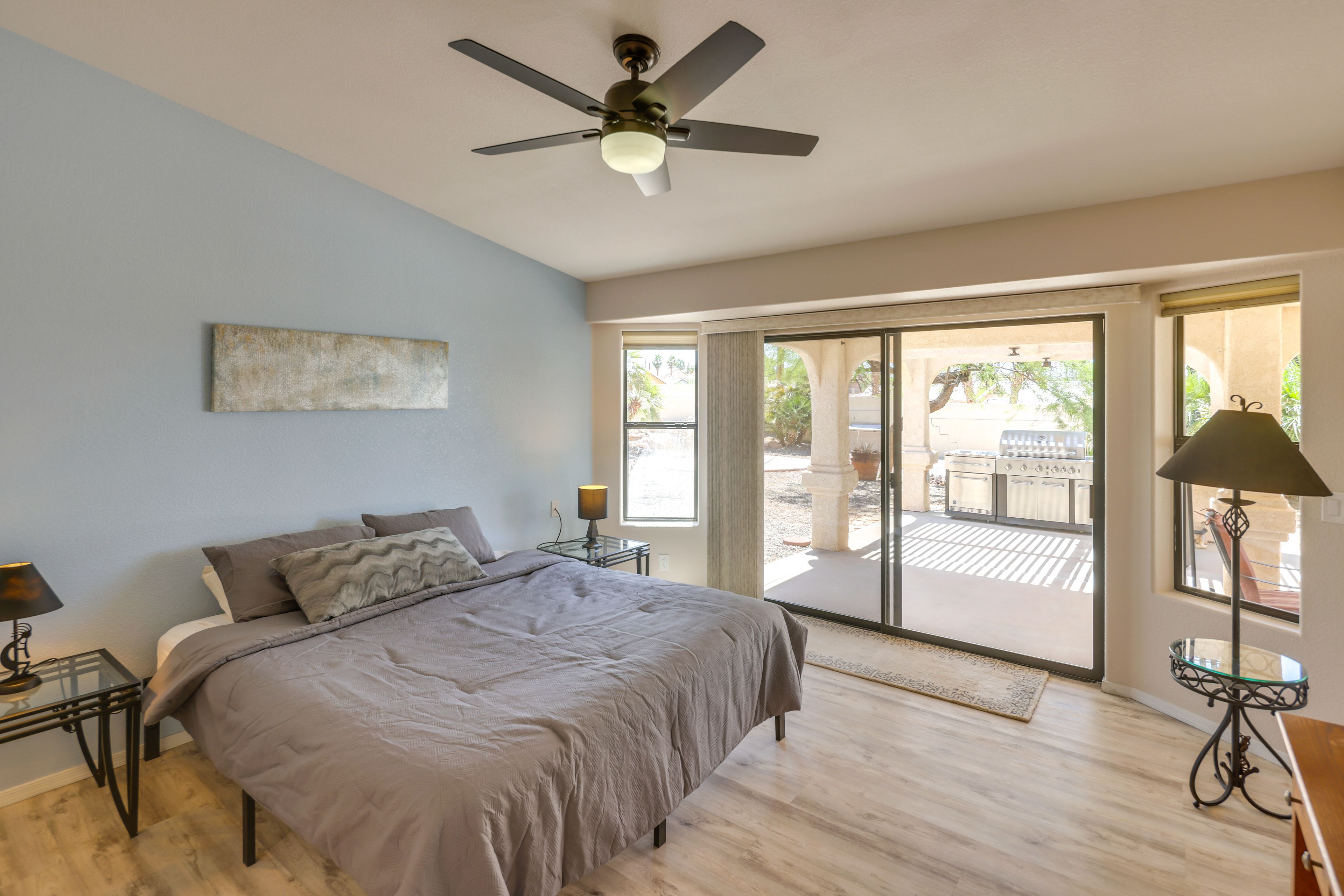 Bedroom 1 | California King Bed | En-Suite Bathroom | Patio Access