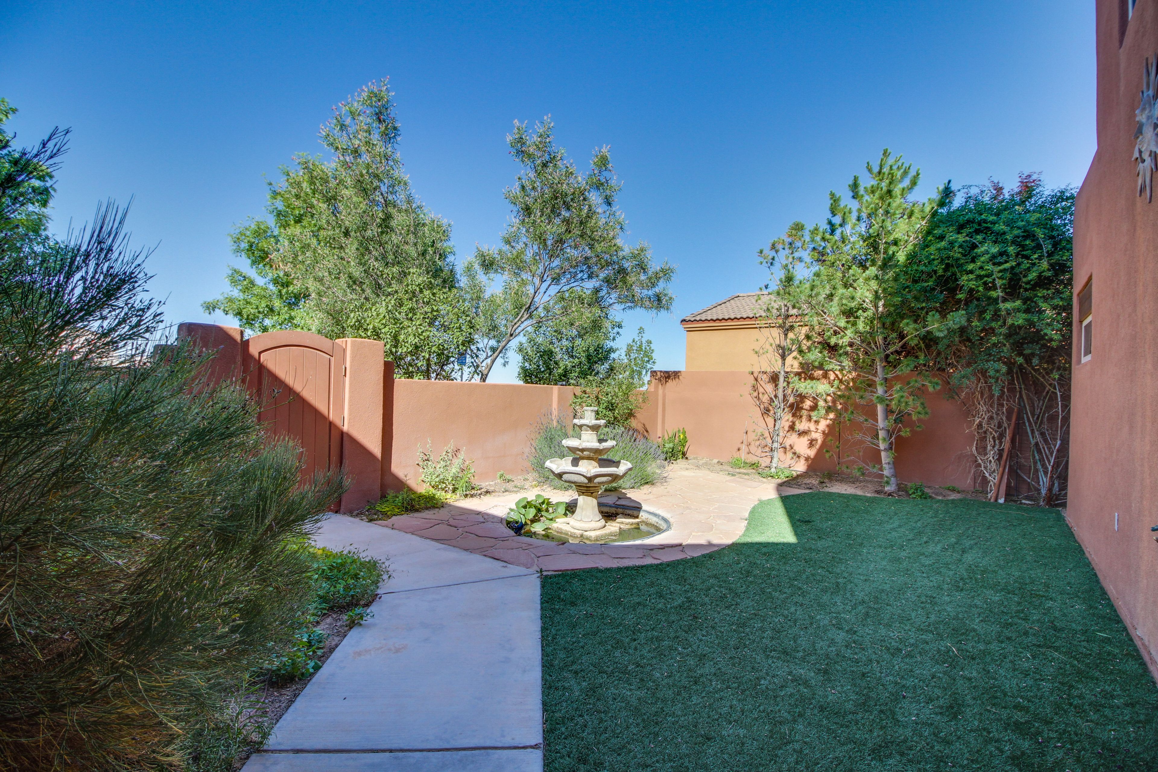 Private Fenced Yard w/ Pond & Fountain