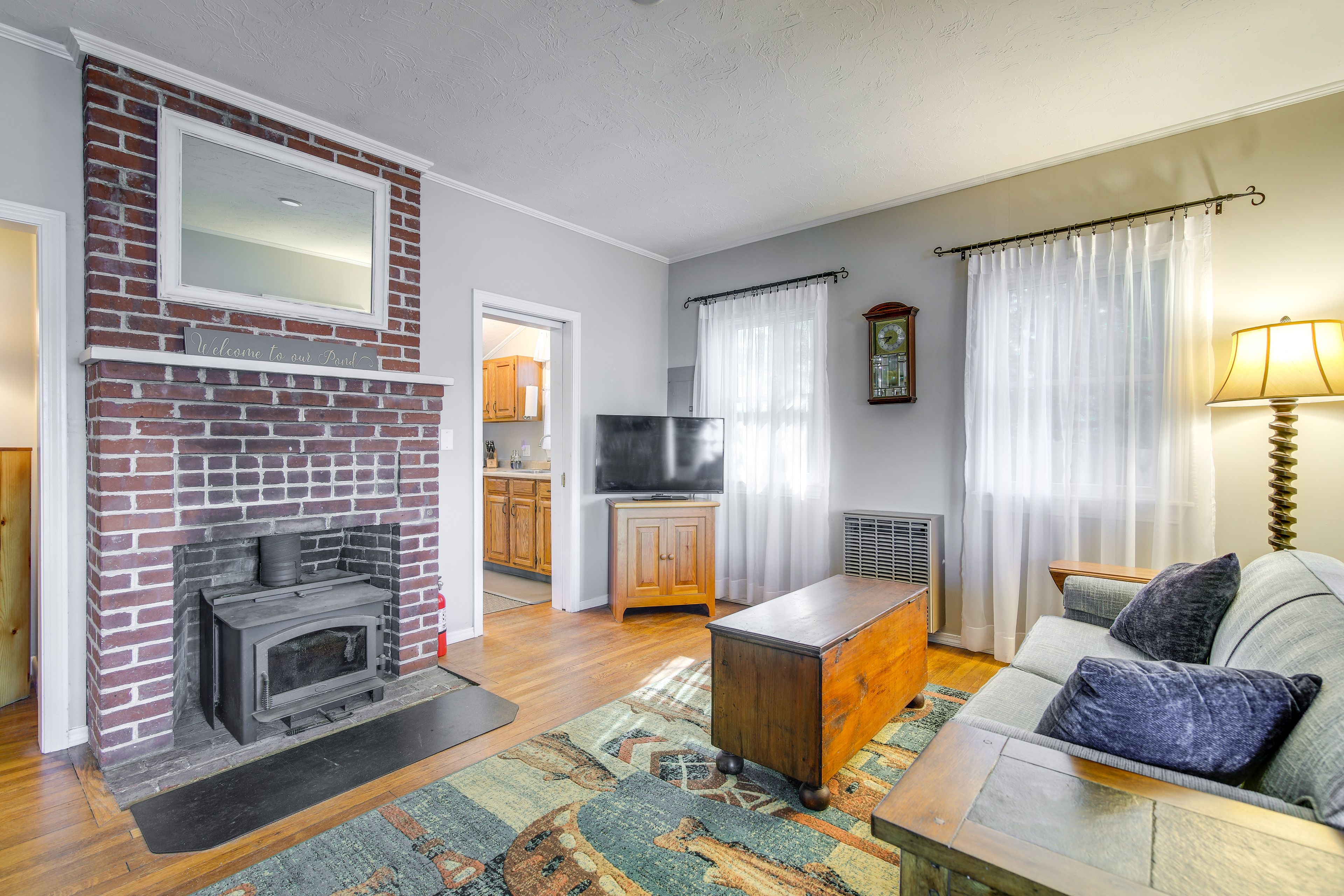 Living Area | Full Sleeper Sofa | Smart TV | Wood-Burning Stove | Board Games