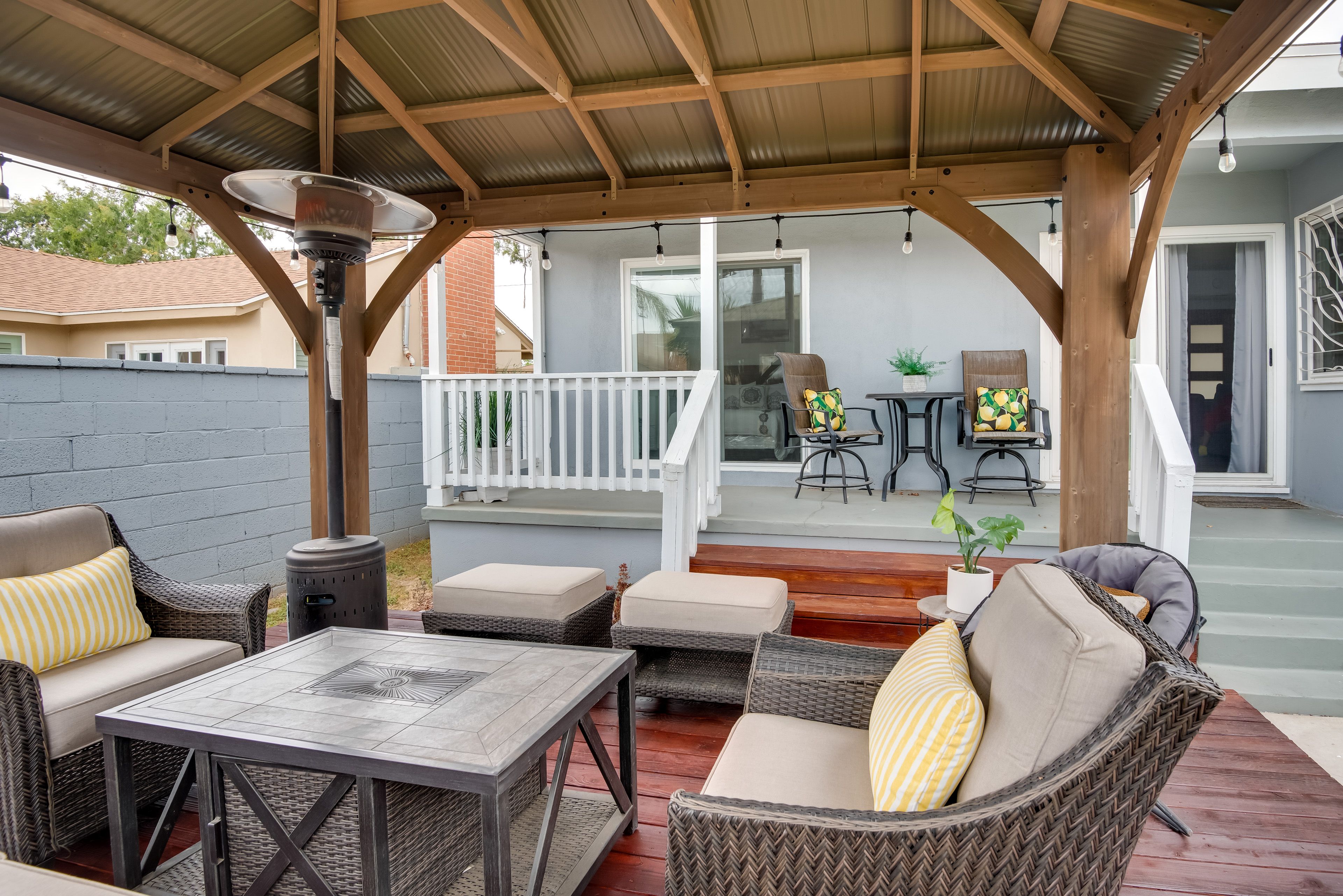 Patio | Covered Deck | Fenced-In Yard | Charcoal Grill