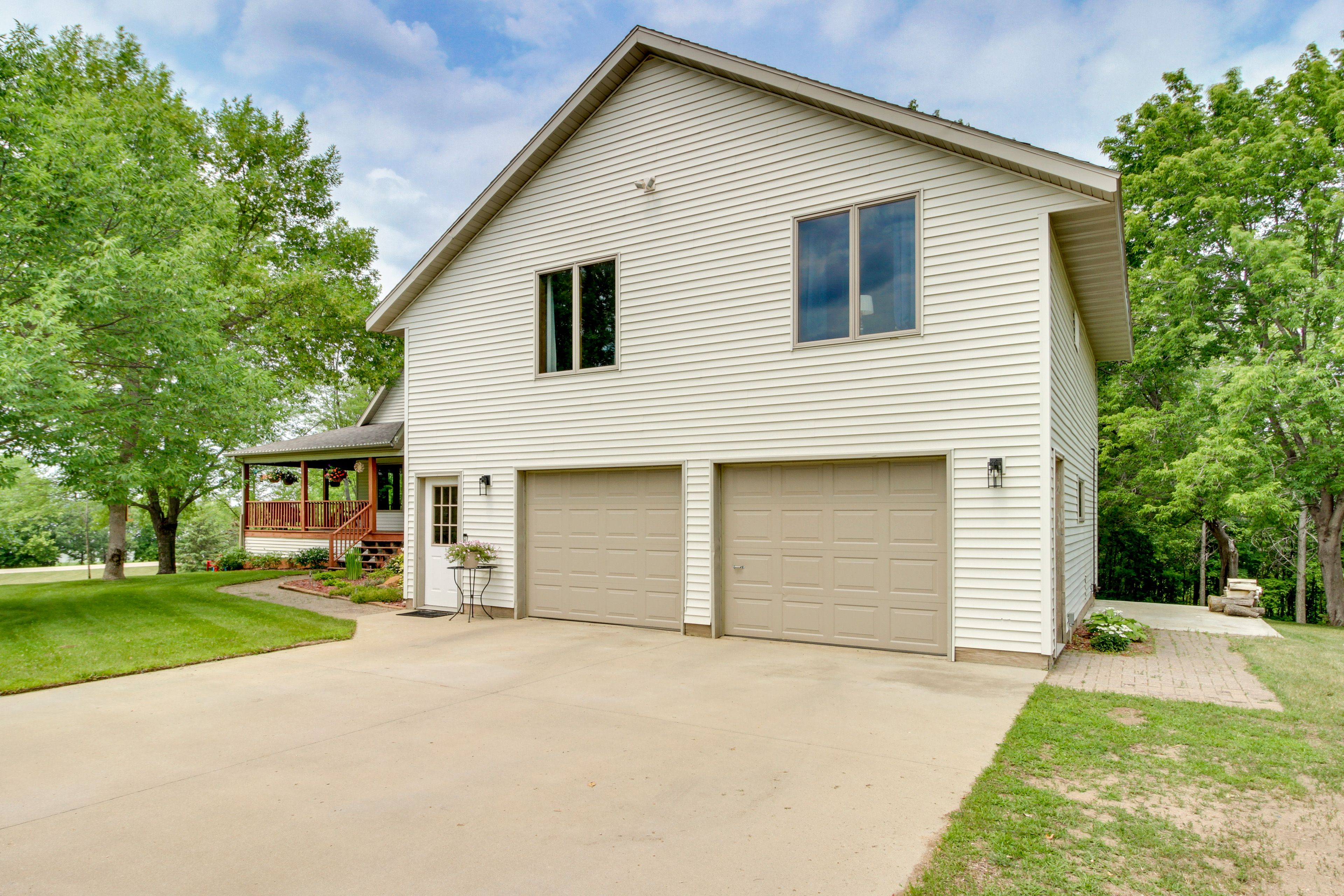 Unit Entrance | Driveway (2 Vehicles) | Behind Barn (3 Vehicles)
