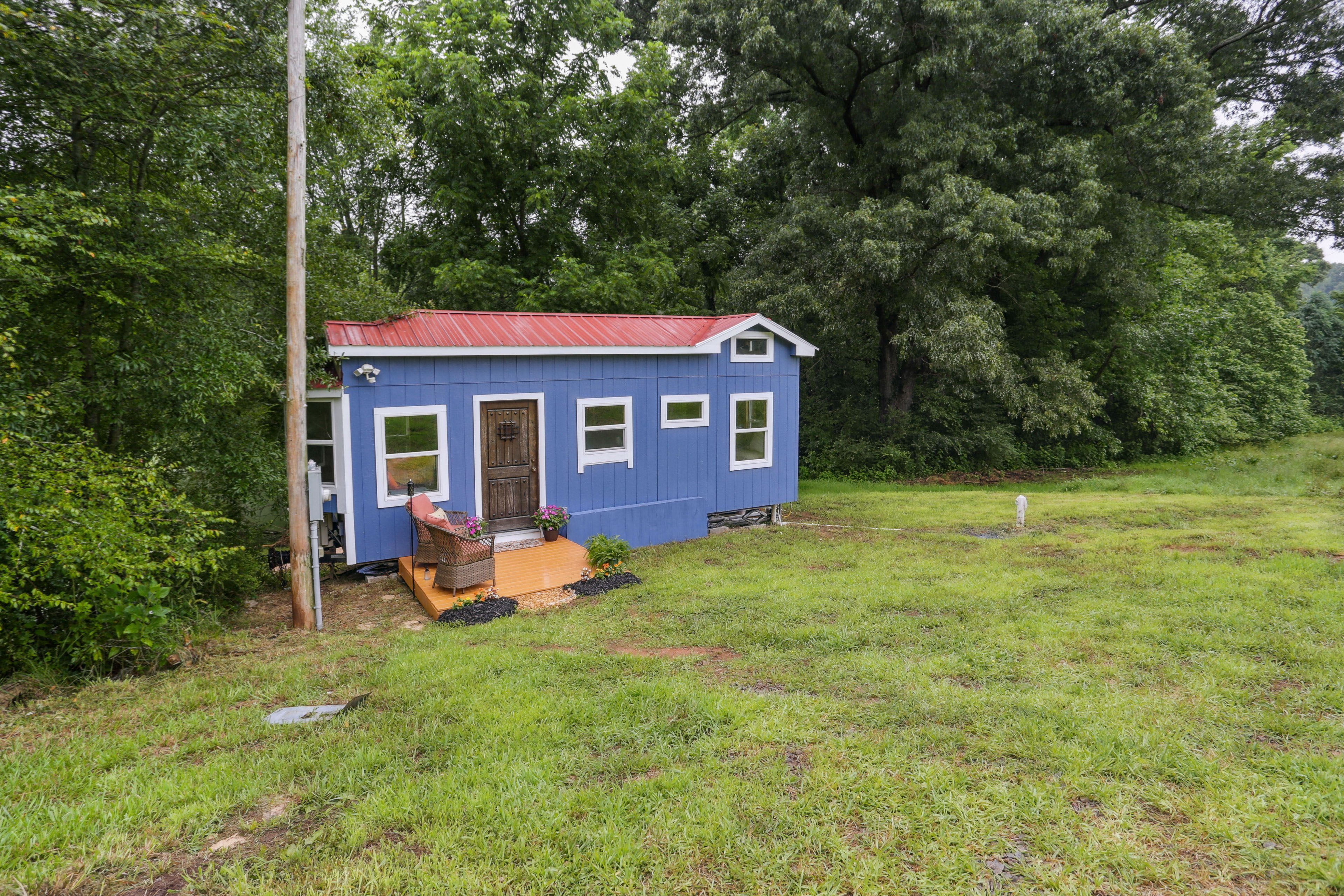 Cabin Exterior | Wooded Views | Fire Pit