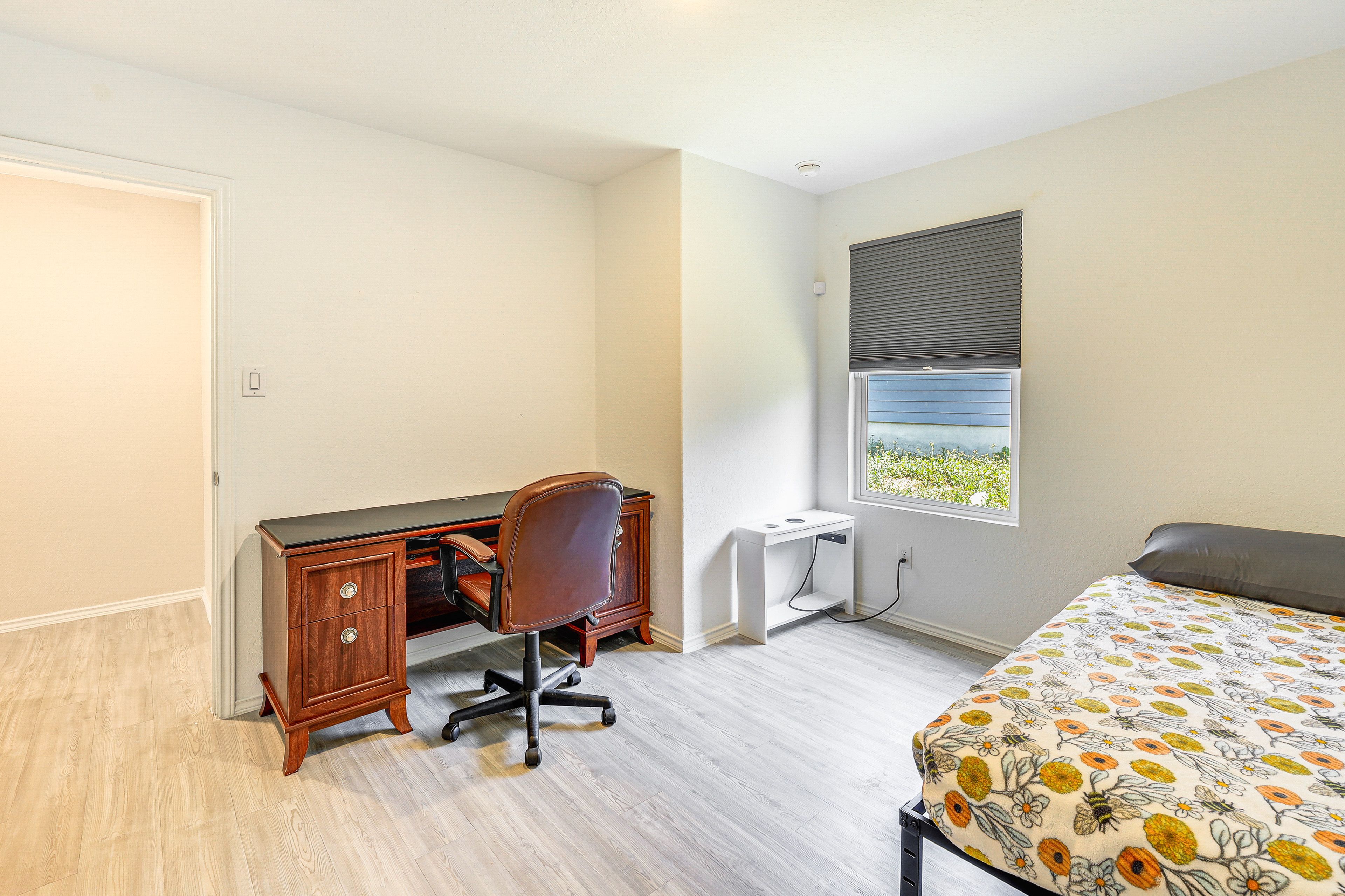 Bedroom 1 | Twin Bed | Desk | Walk-In Closet | En-Suite Bathroom