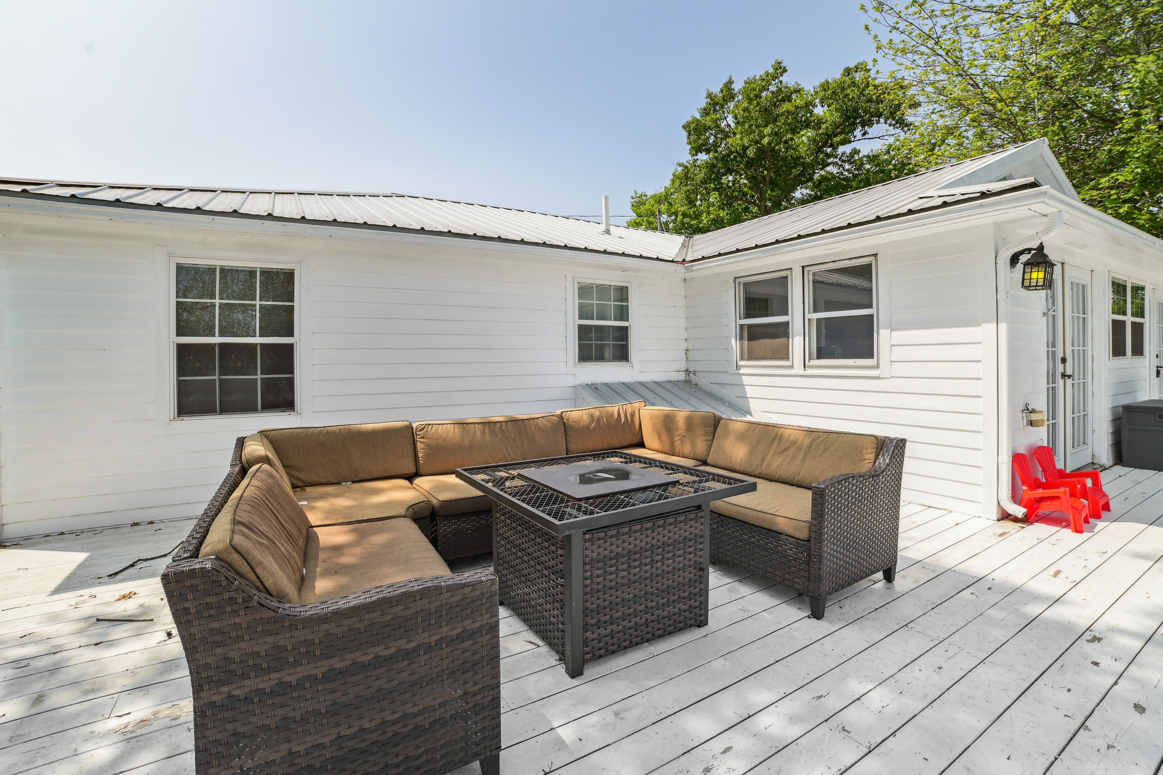 Cottage Exterior | Furnished Deck | 2 Kayaks