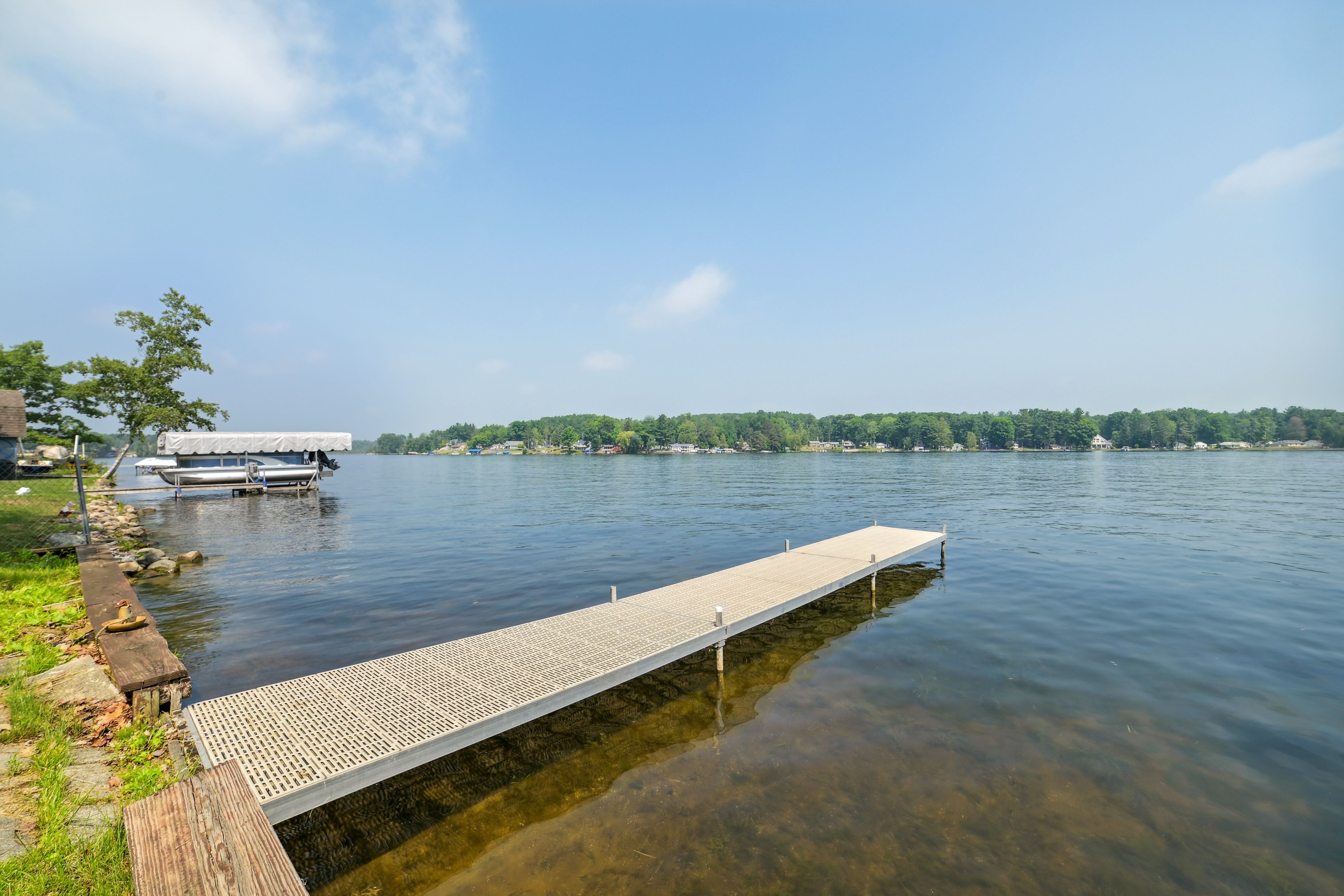 Cottage Exterior | Private Boat Dock | Lake Access On-Site