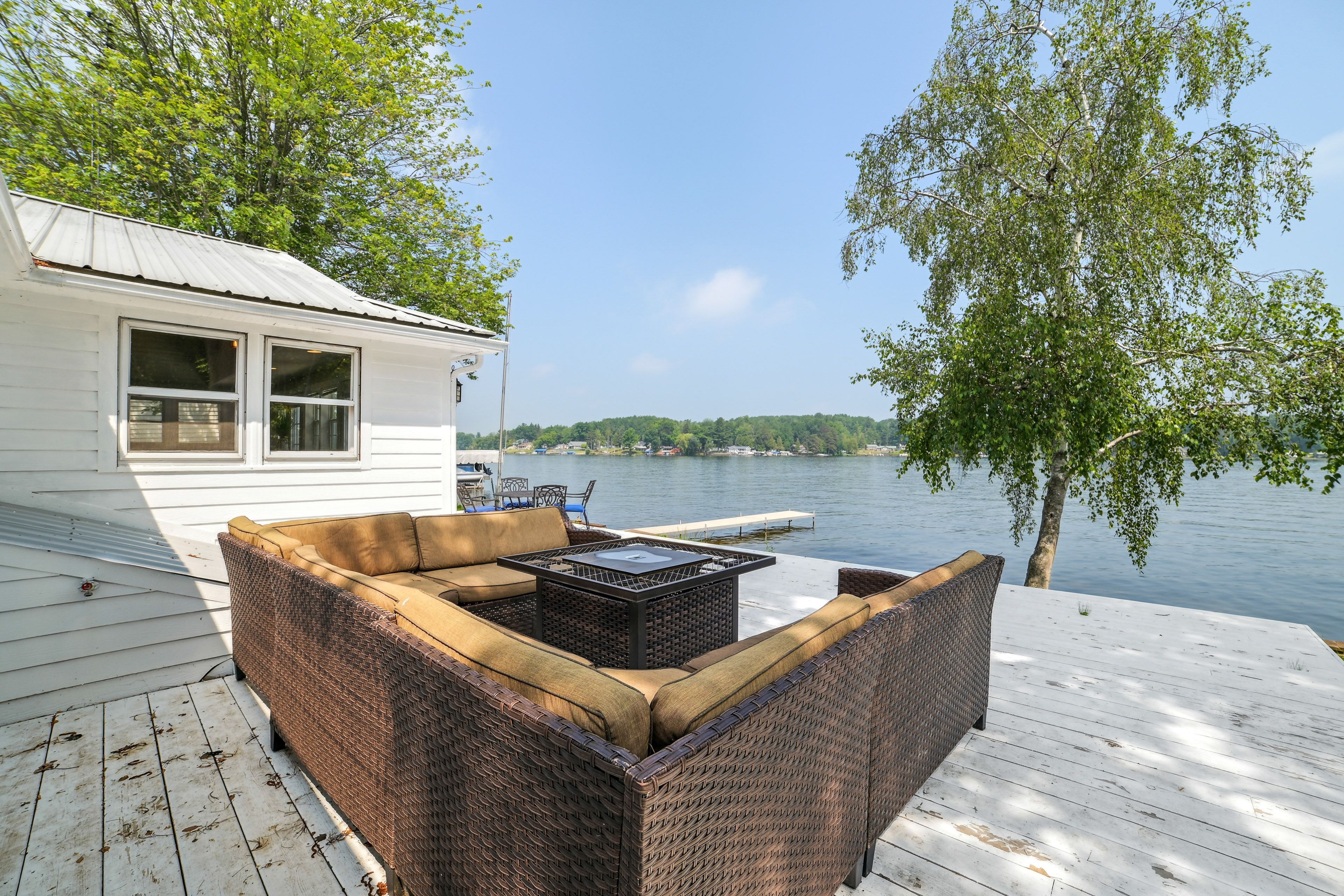 Cottage Exterior | Furnished Deck | Lake Views