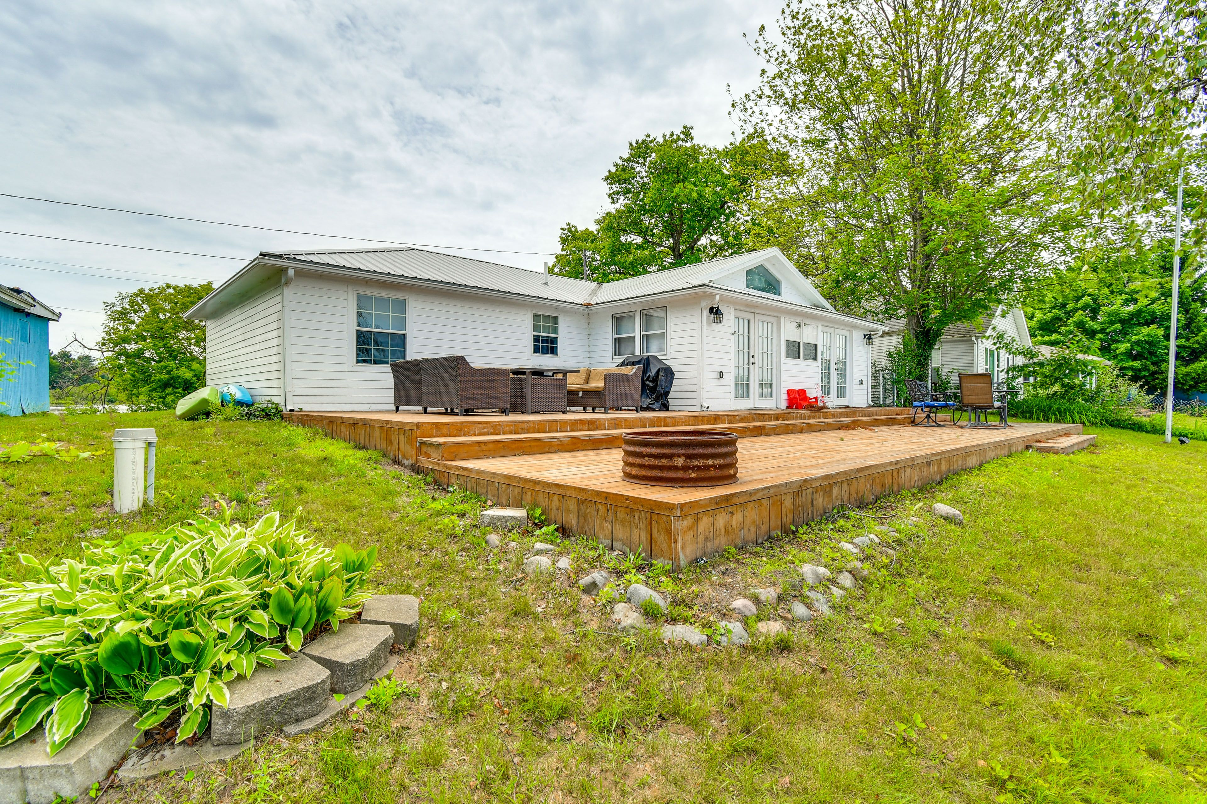 Cottage Exterior | Furnished Deck | 2 Kayaks