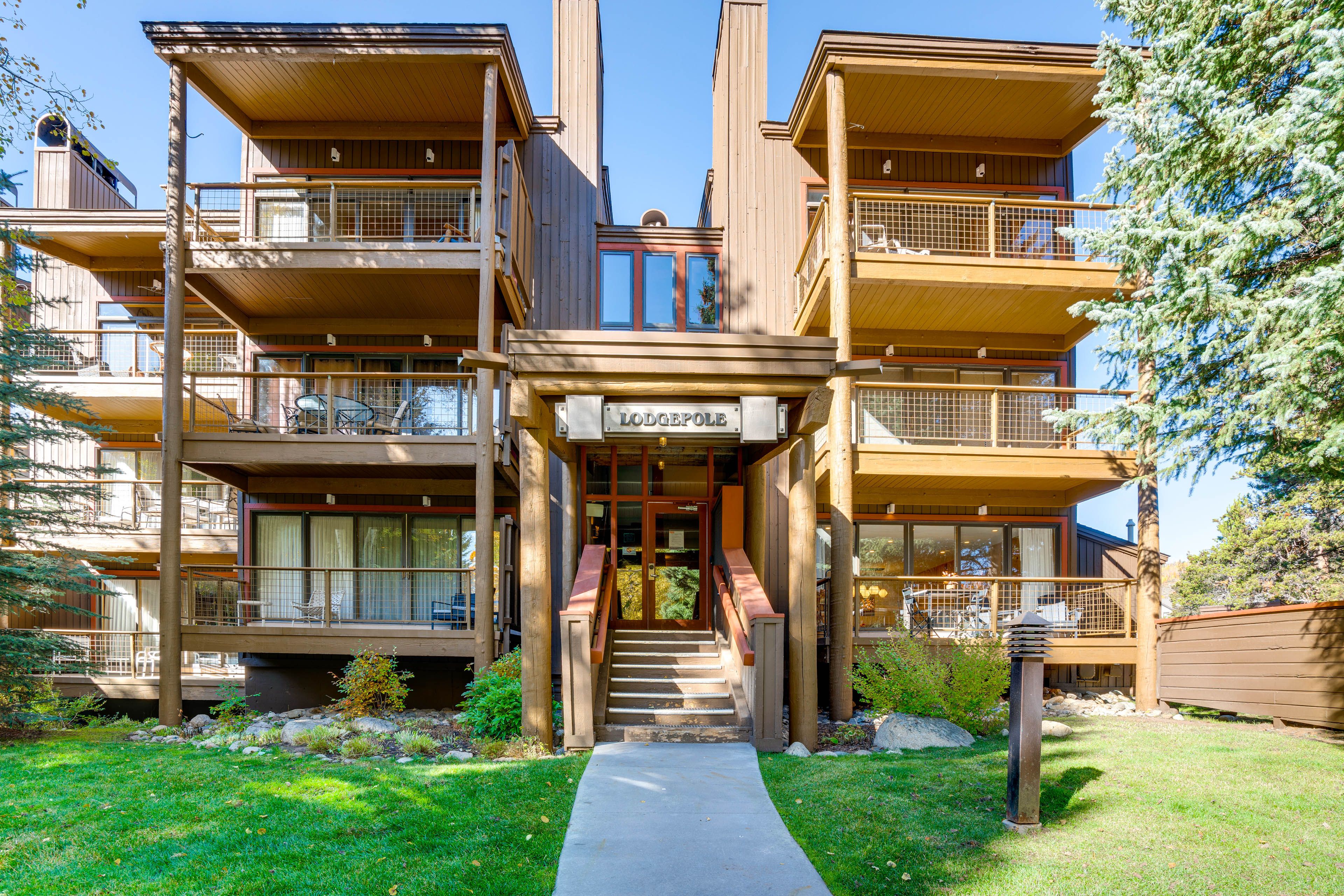 Condo Exterior | Parking | Community Lot (2 Vehicles, Passes Provided)