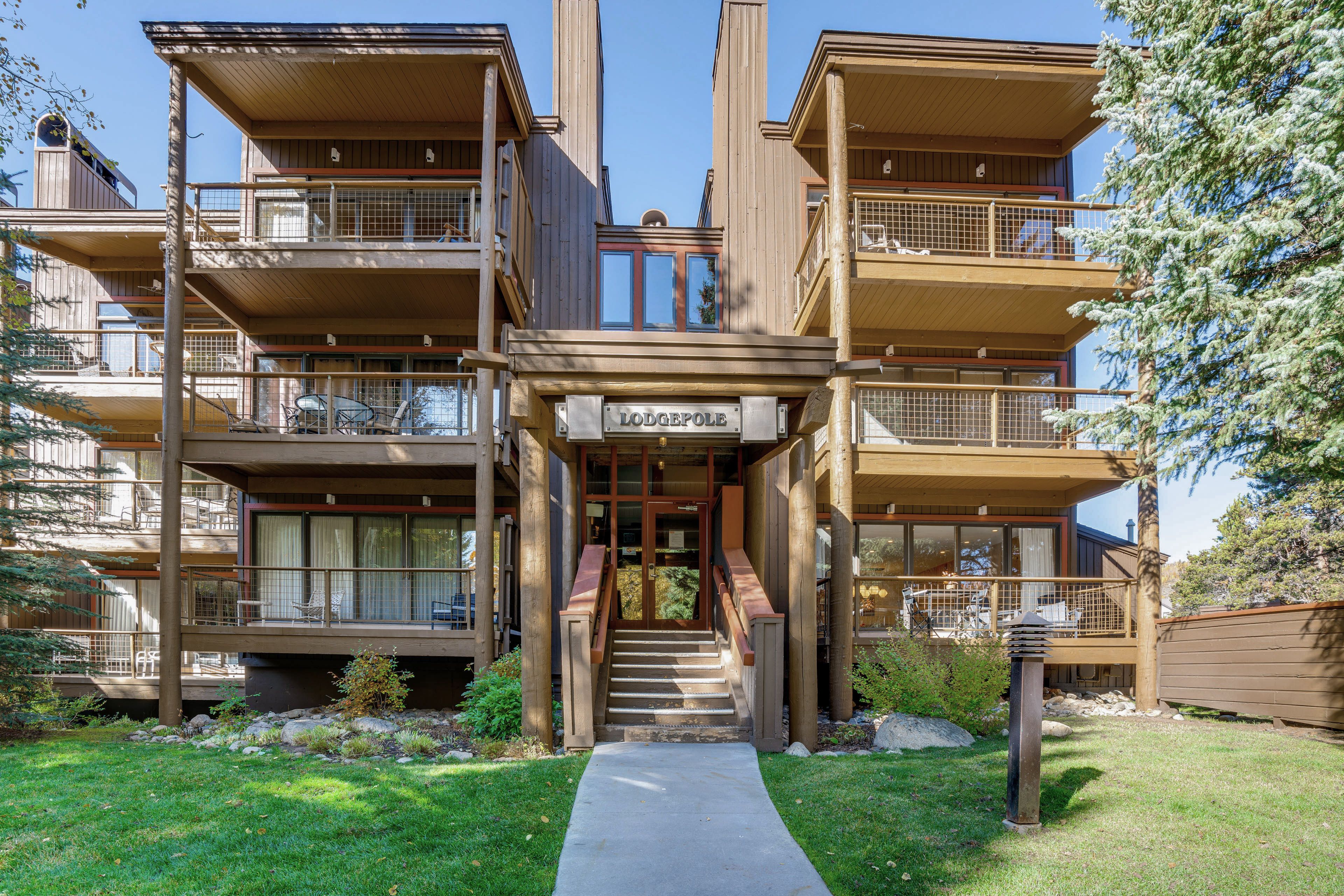 Condo Exterior | Parking | Community Lot (2 Vehicles, Passes Provided)