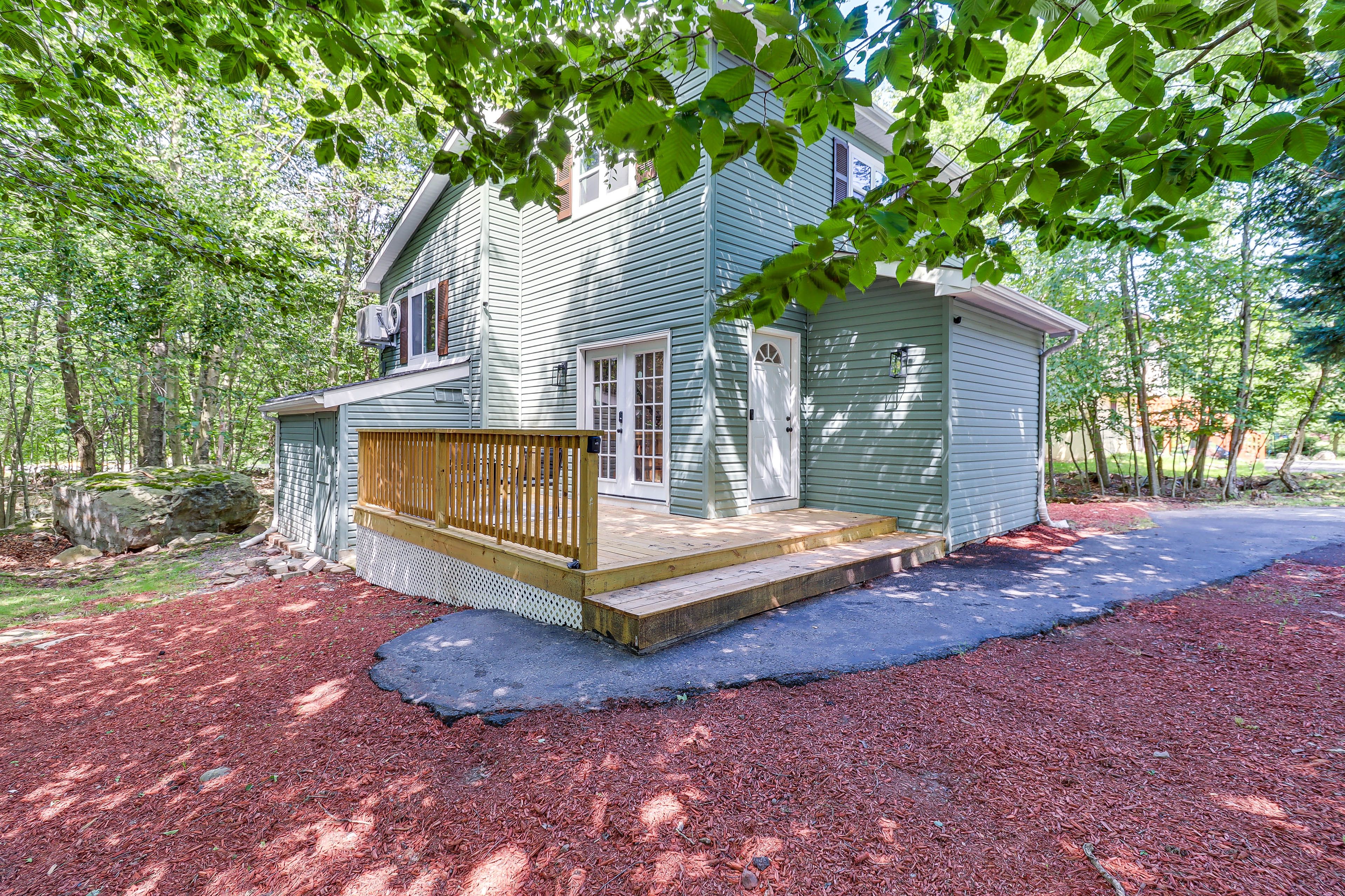 House Exterior | Deck w/ Seating | Pets Welcome w/ Fee